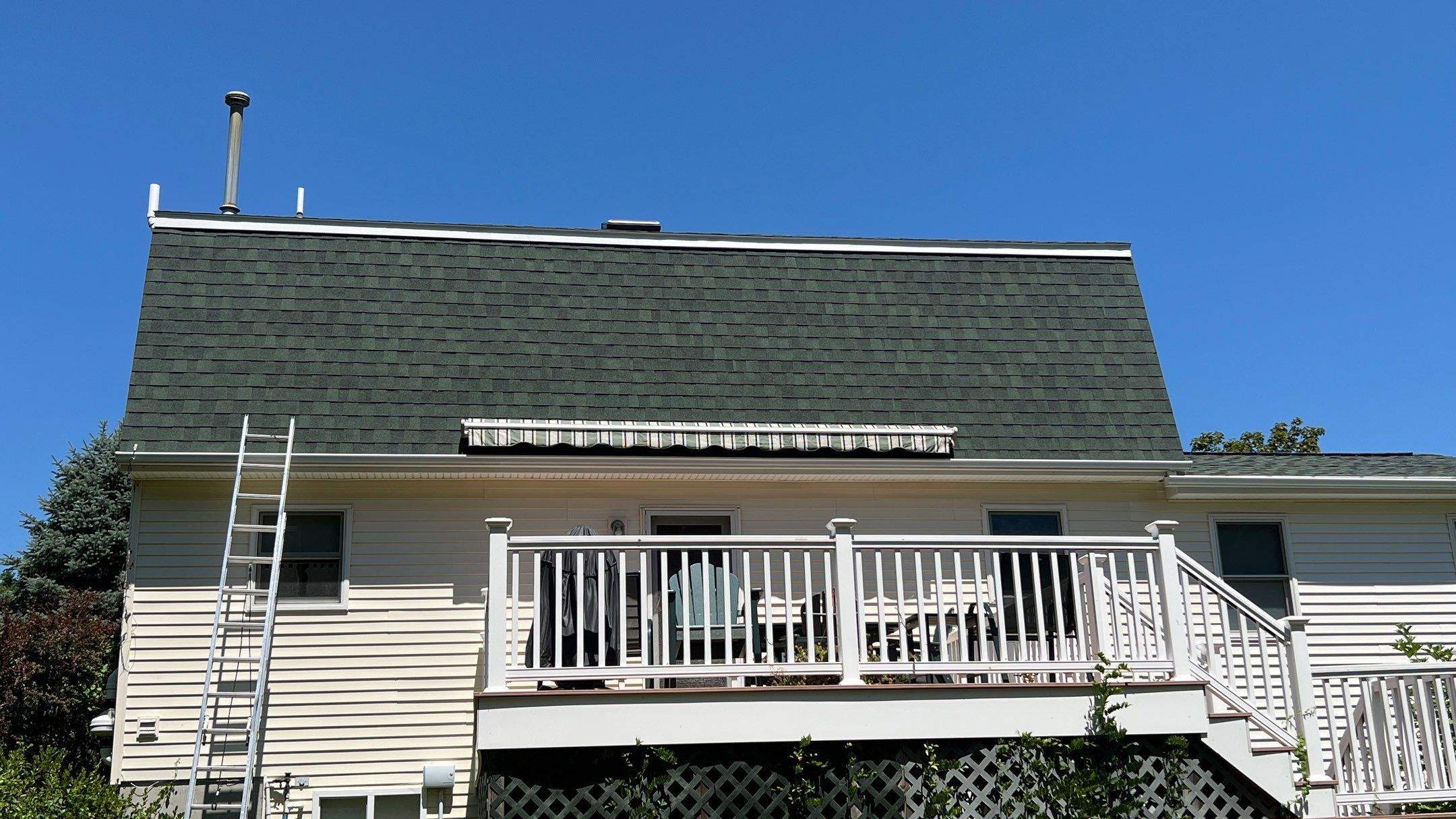 Hunter Green Roofs by Pinnacle Roofing & Skylights