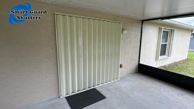 Accordion Shutters in Ivory 