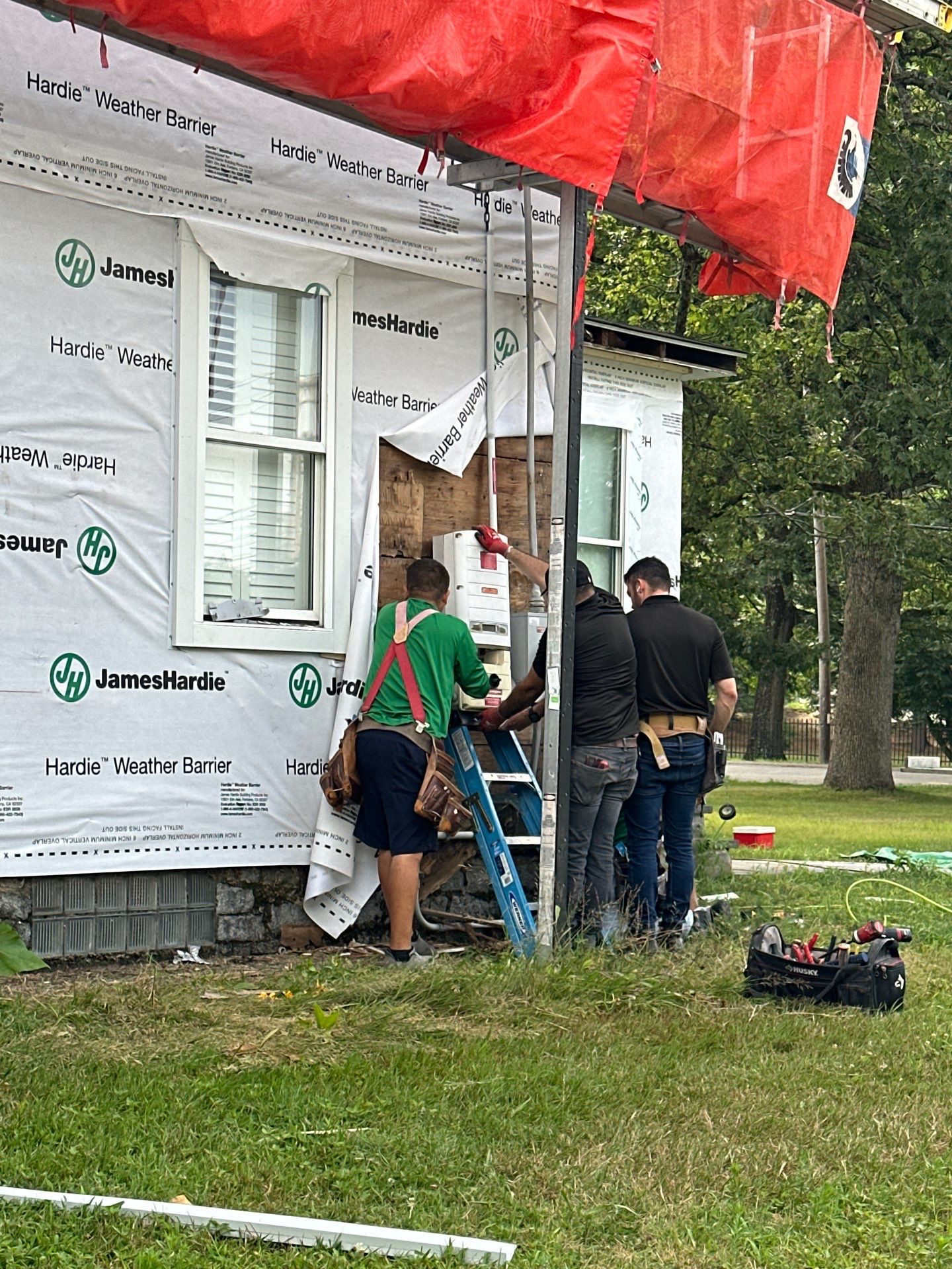 James Hardie Lap Siding Installation in Chelmsford, MA by Mighty Dog Roofing of Greater Middlesex County