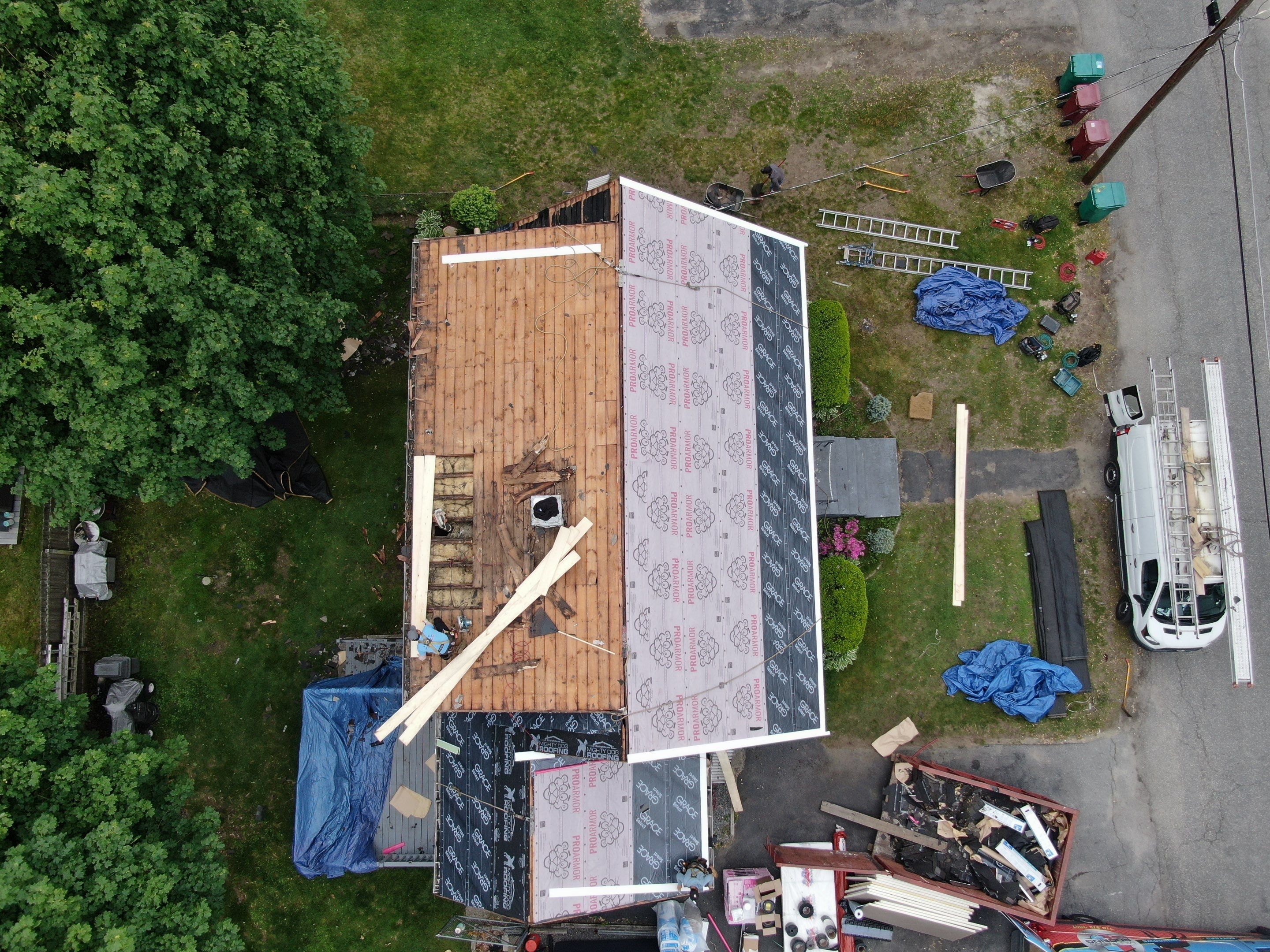 Roof and Flat Roof Membrane Replacement in Lowell, MA by Mighty Dog Roofing of Greater Middlesex County