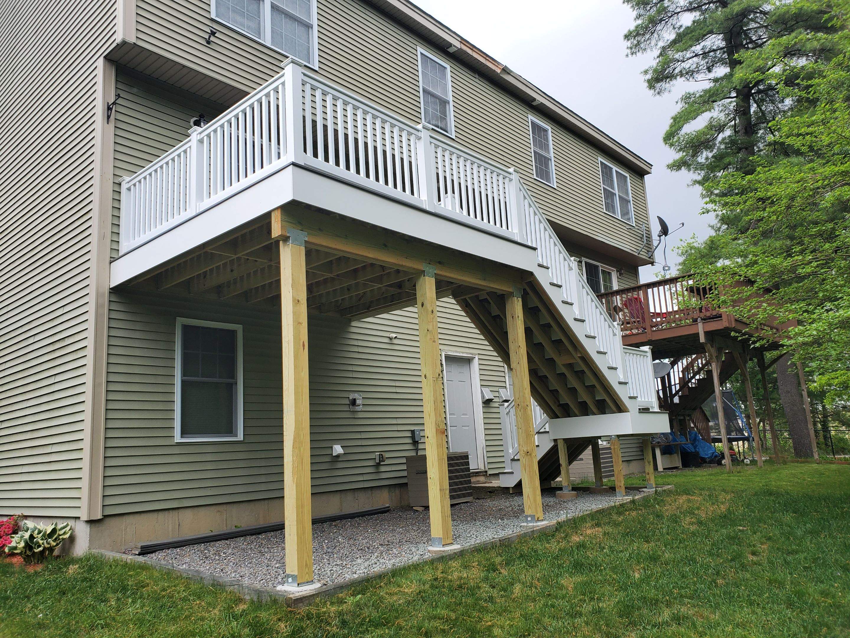 Porch/Deck Construction using Trex Decking by UBrothers Construction