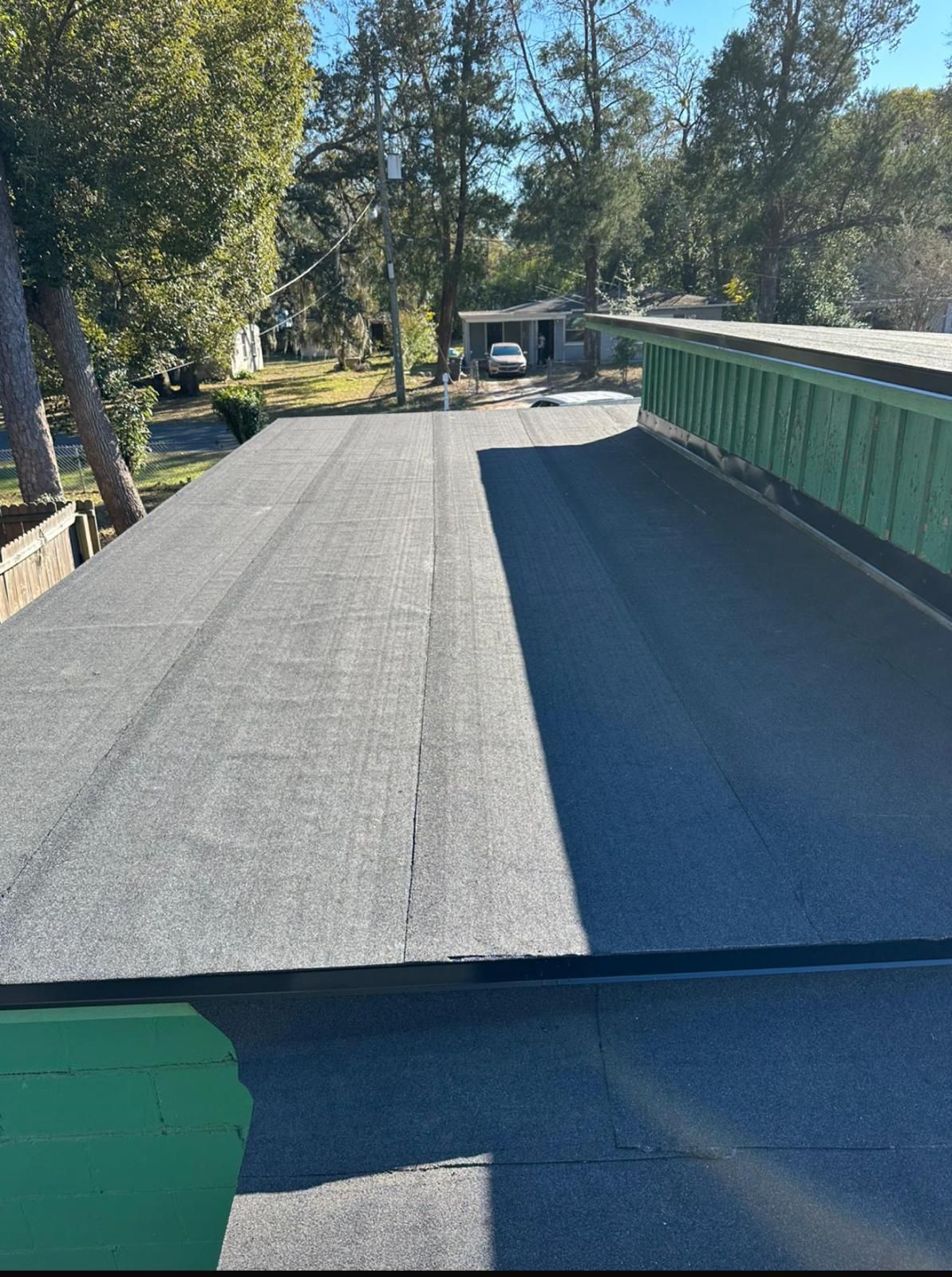 Flat Roof Renovation Due to Water Accumulation by urban green energy llc