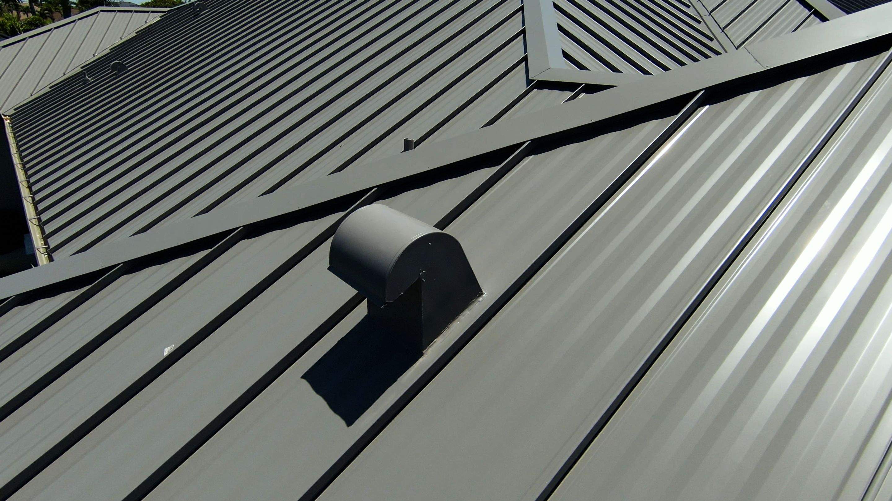 Residential Roofing Installation using Gulf Coast Metals Gulf Seam Panels by Four Peaks Roofing