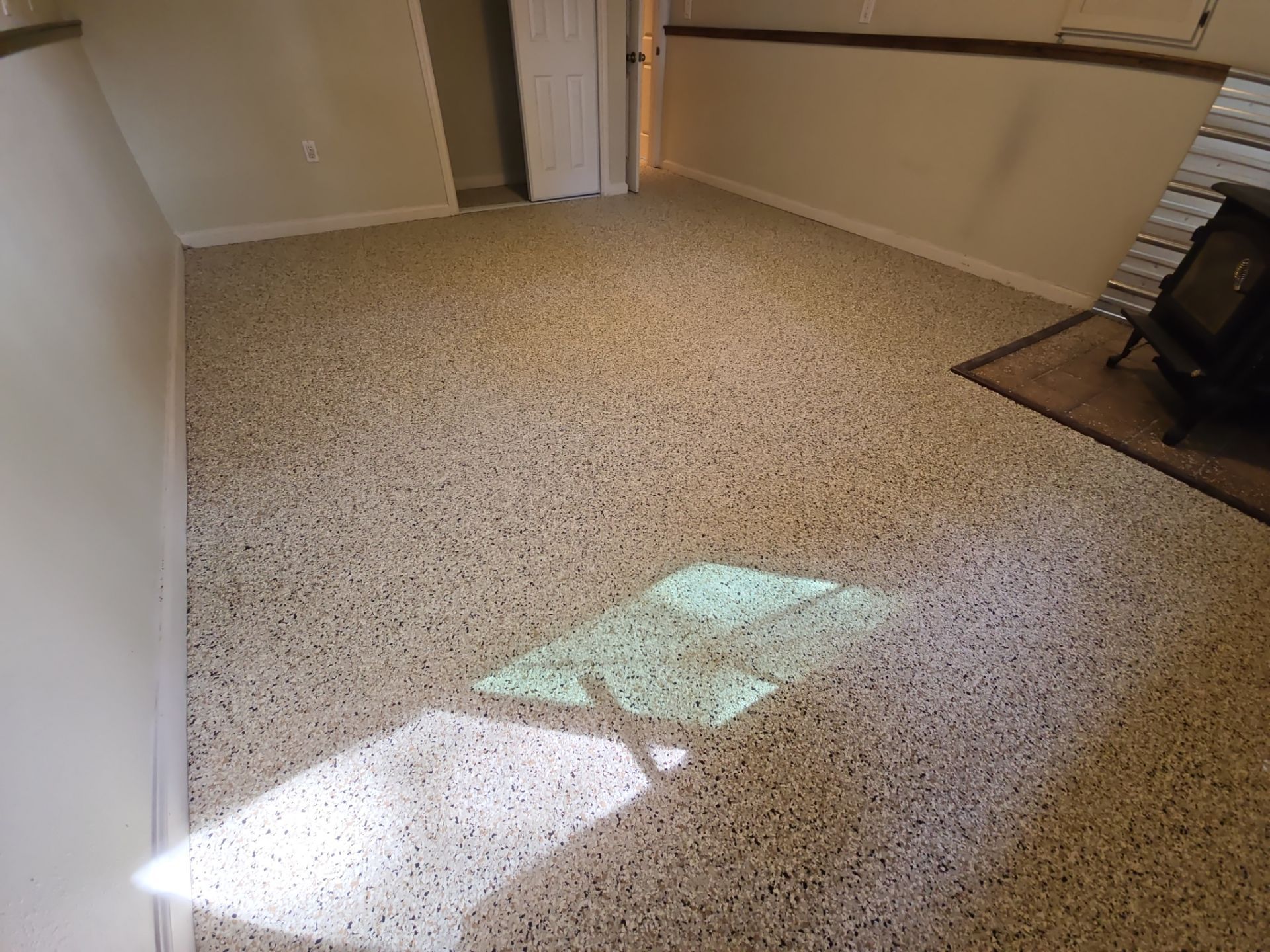 Basement Transformation using Driftwood by Croc Coatings, LLC