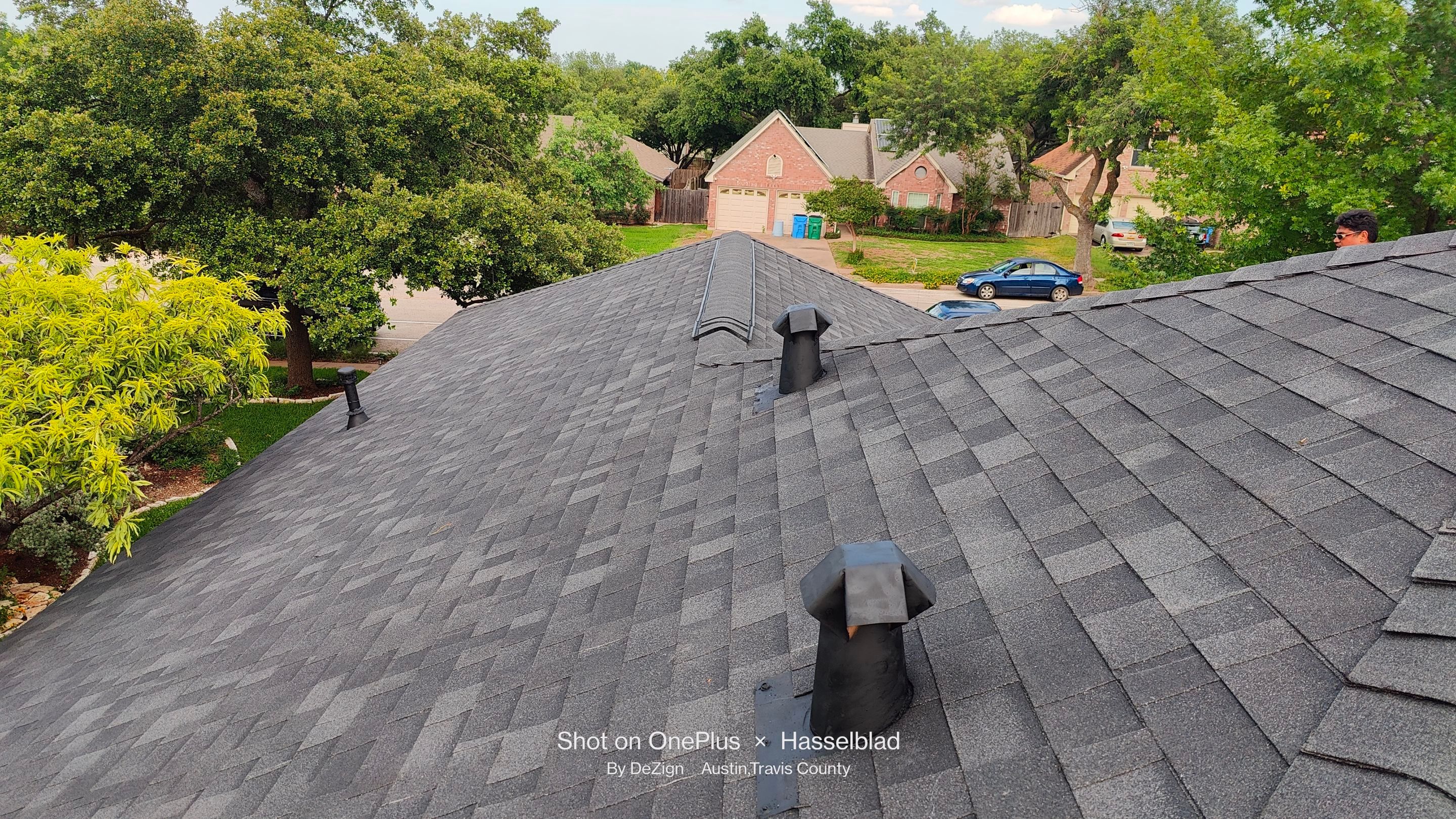 Residential Roofing Installation using Owens Corning Oakridge Onyx Black by DeZign Roofing & Exteriors
