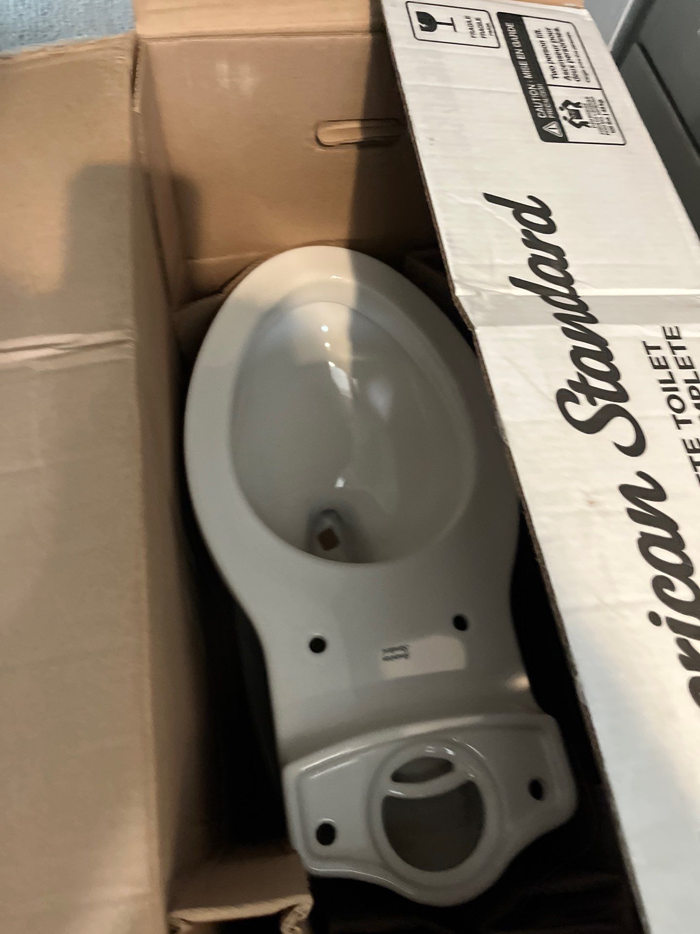 Installed Toilet and Shower Fixtures by Us Plumbing 