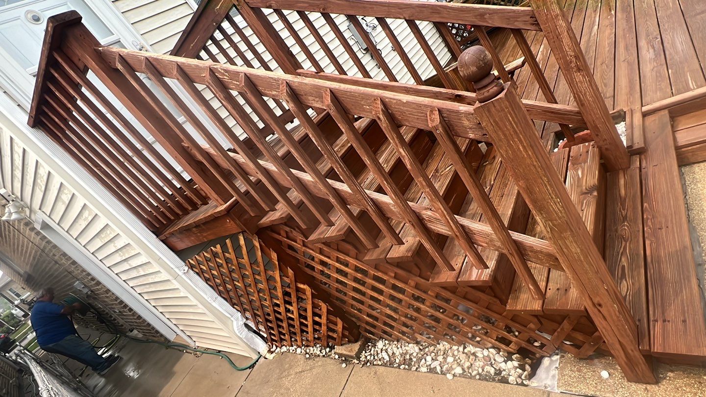 Wood cleaning and staining using Armstrong cloark oil stain by Northern Power Washing LLC.