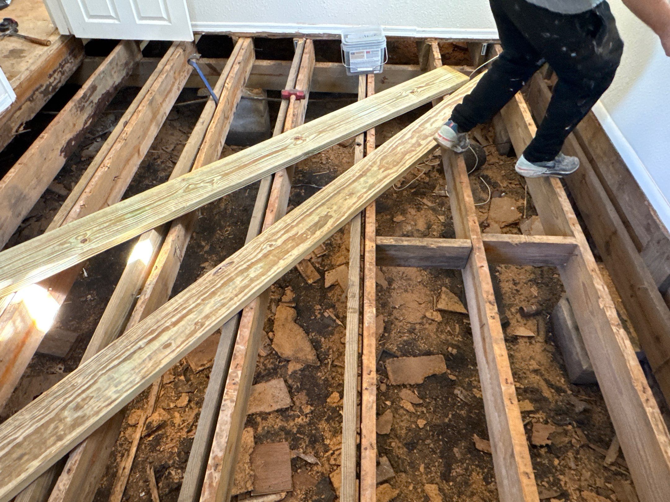 Subfloor Repairs & Flooring Installation by Axtra Hand