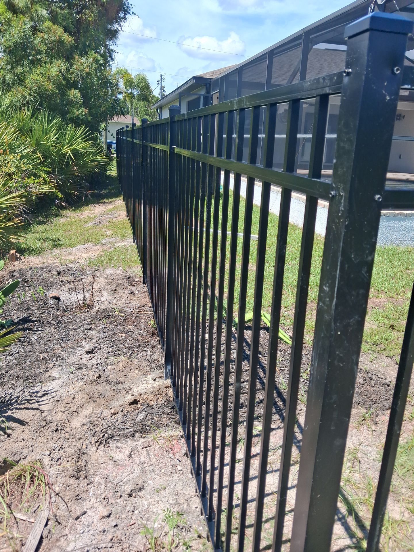 Black Aluminum Perimeter Fence and Gate Installation in Port Charlotte by True Fence LLC