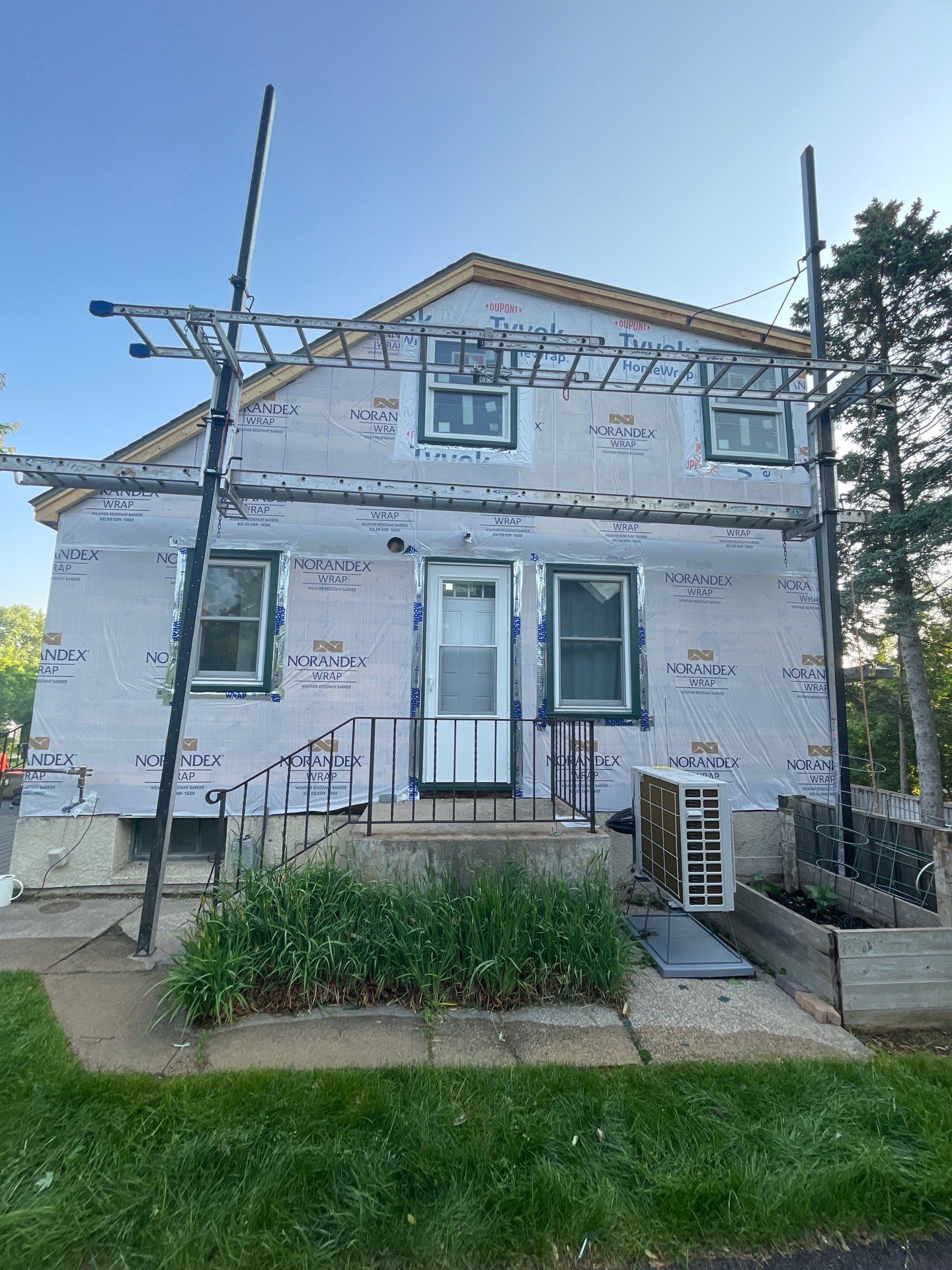 St. Louis Park Roof & Siding Replacement – LP Smartside, Mule-Hide Modified Bitumen, Edco Soffit & Fascia by First Impressions Exteriors