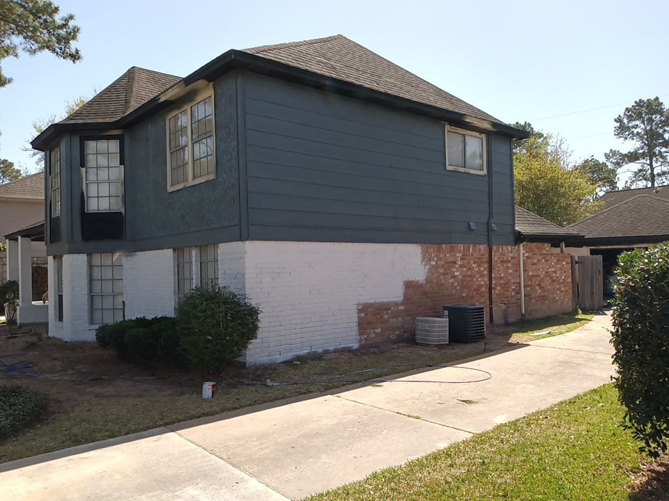 Interior and exterior painting project by Roof Concepts Construction