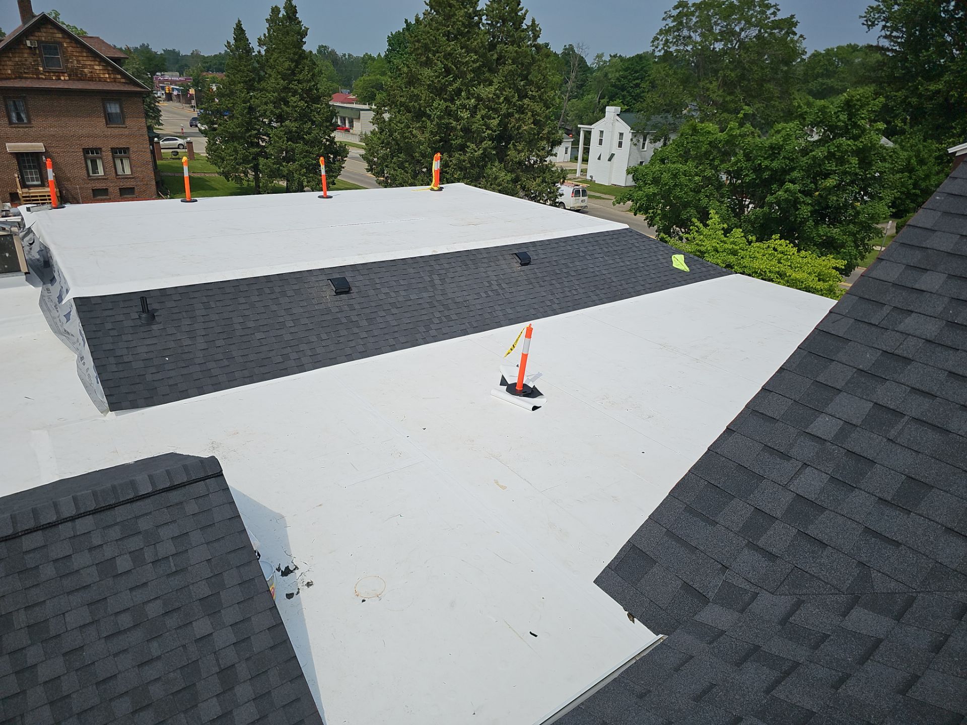 Commercial Flat and Shingled Roof Project by 42 North Construction, LLC.