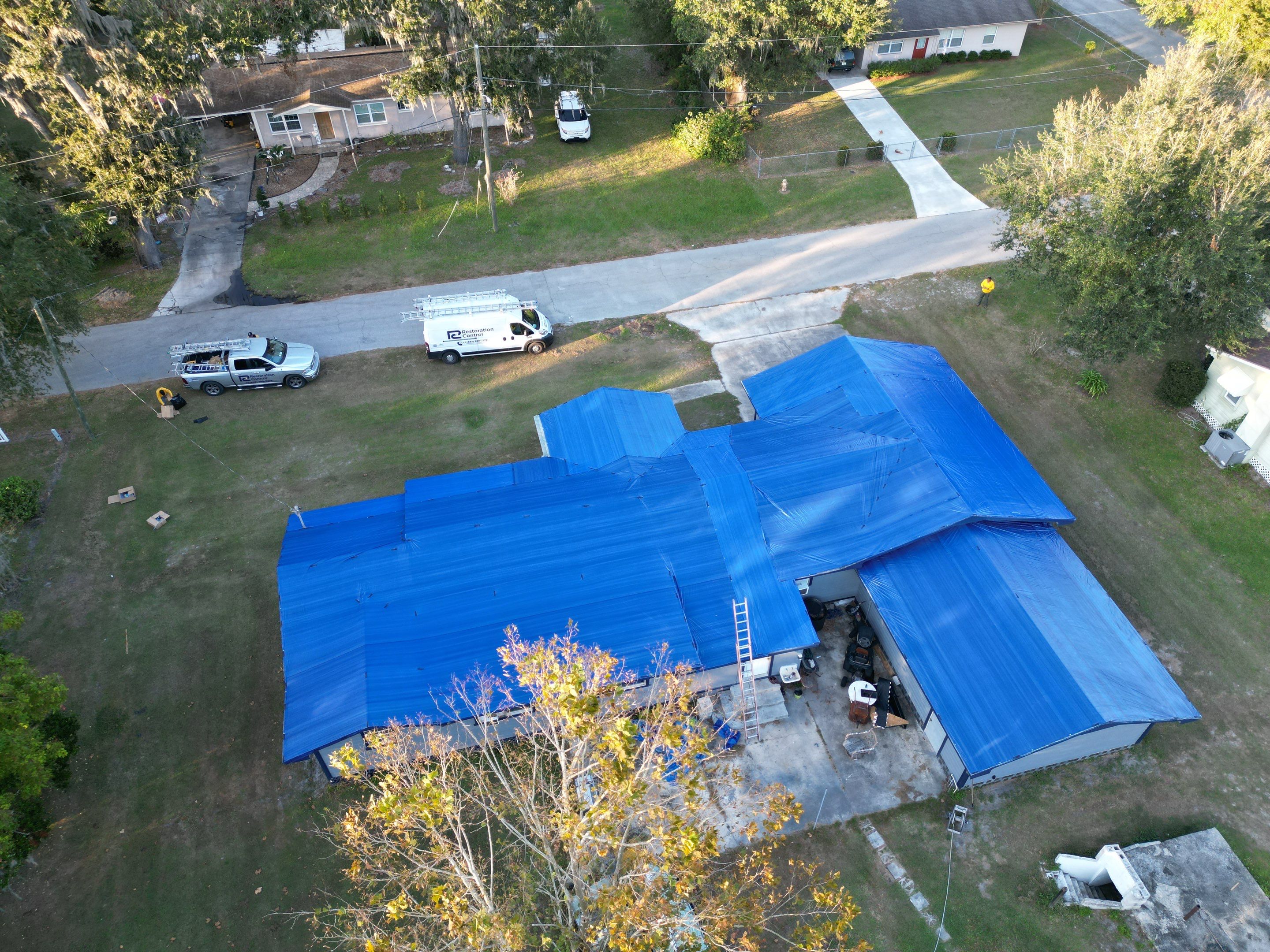 Tarp using TARP BLUE by AquaShield Restoration USA