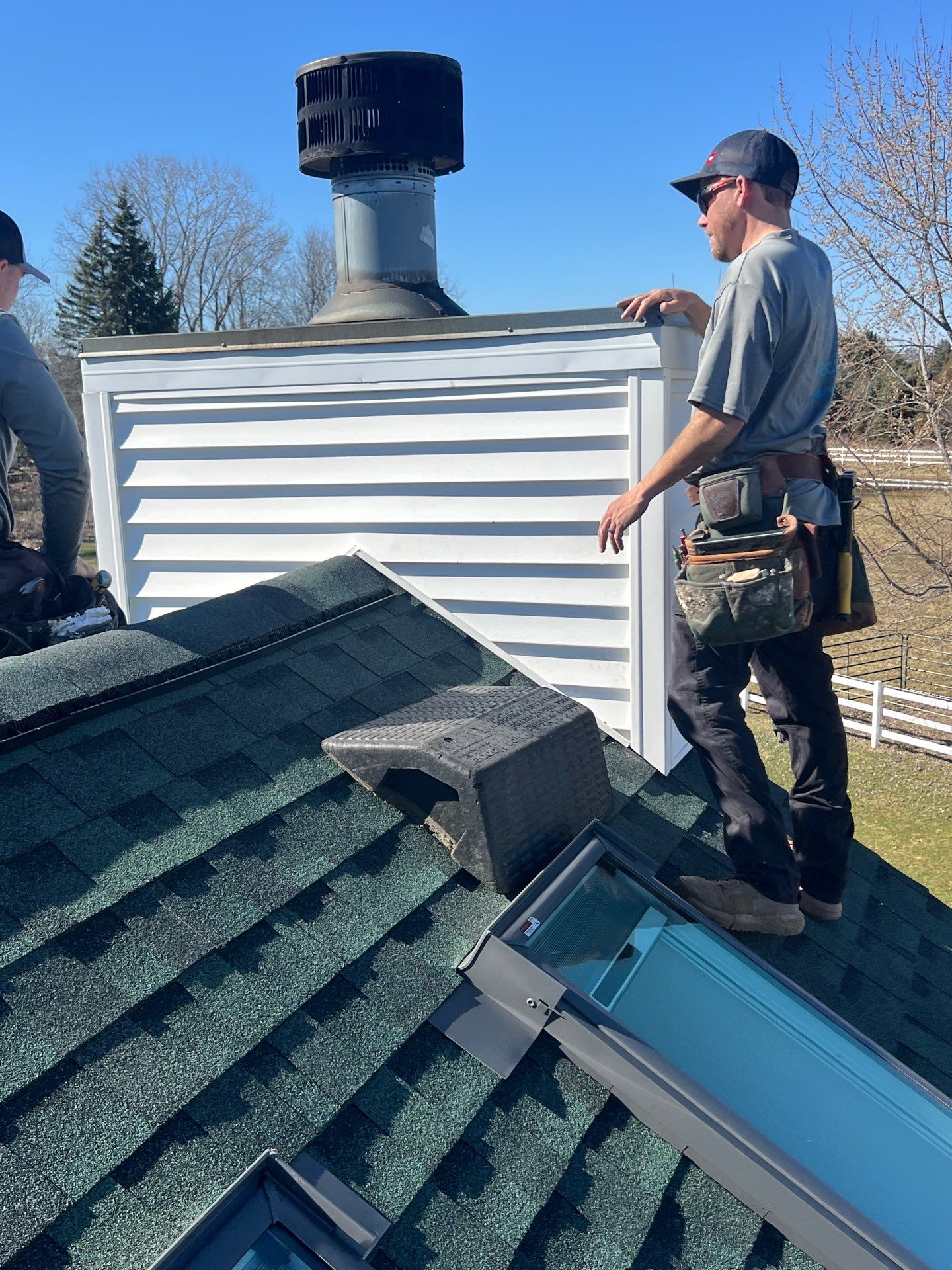 Residential Roofing Replacement with Multiple Skylights in Mason, Michigan by Acme Exteriors