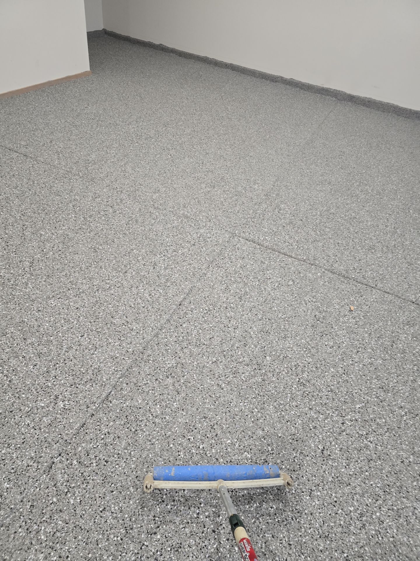 Garage Transformation using Slate Hybrid by Croc Coatings, LLC