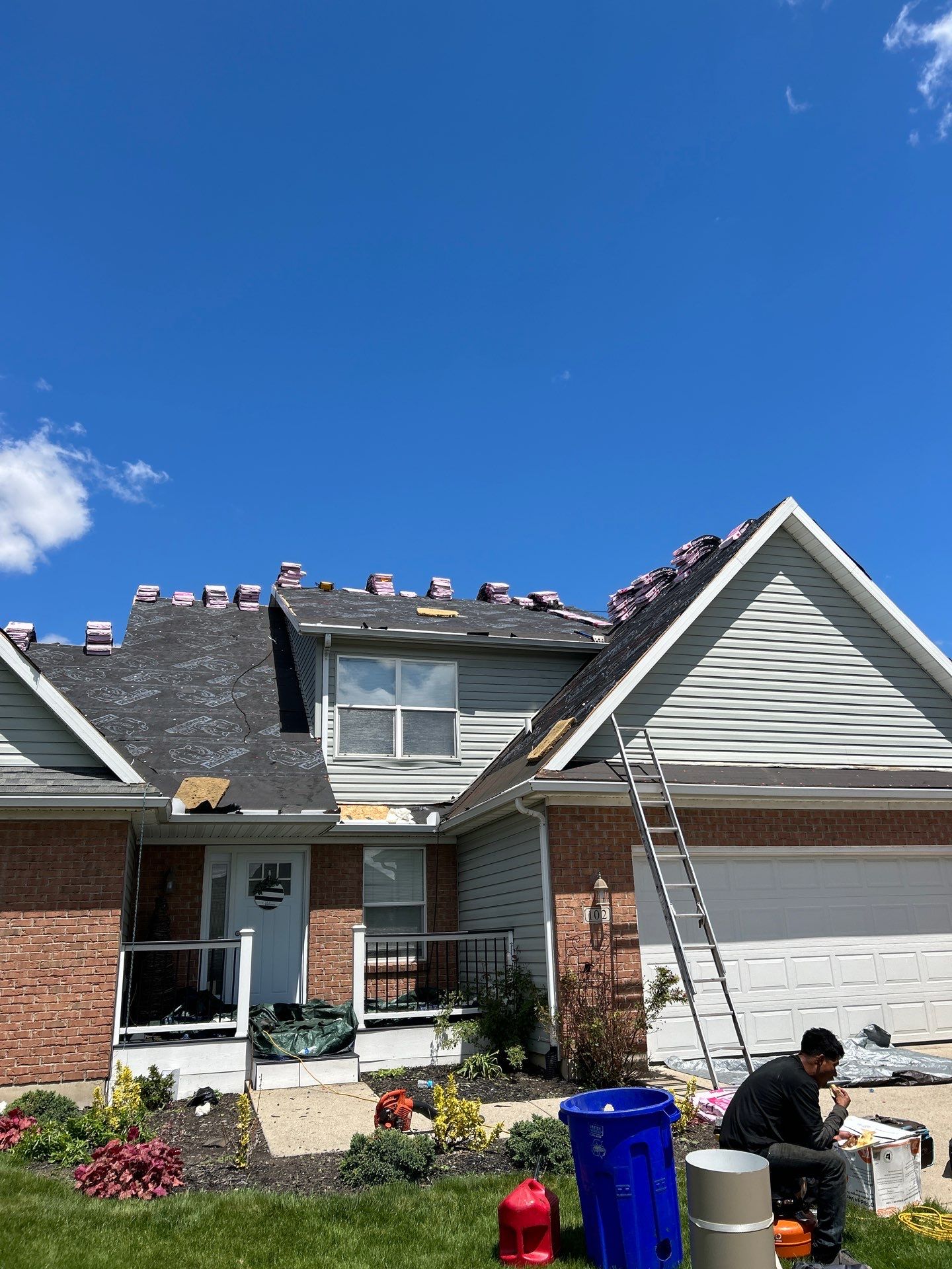 Exterior Installation using Onyx Black Durations and White Siding by WIW Enterprises Inc