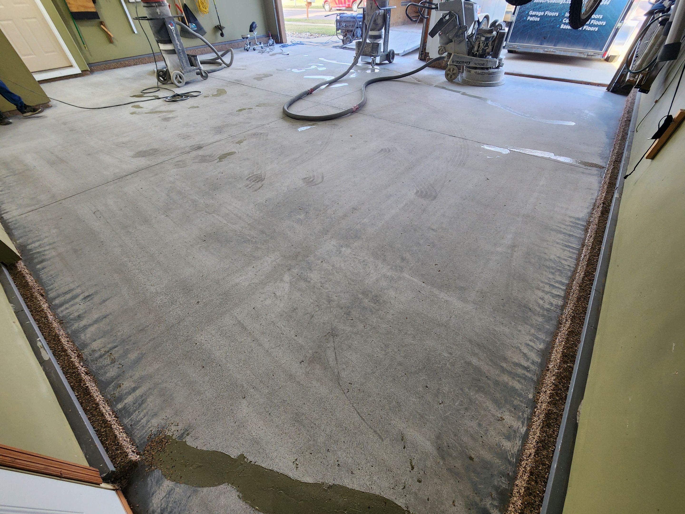 Sioux Falls Garage Floor Concrete Coating with Textured Aggregate by Select Painting, Coatings & Garage Cabinets