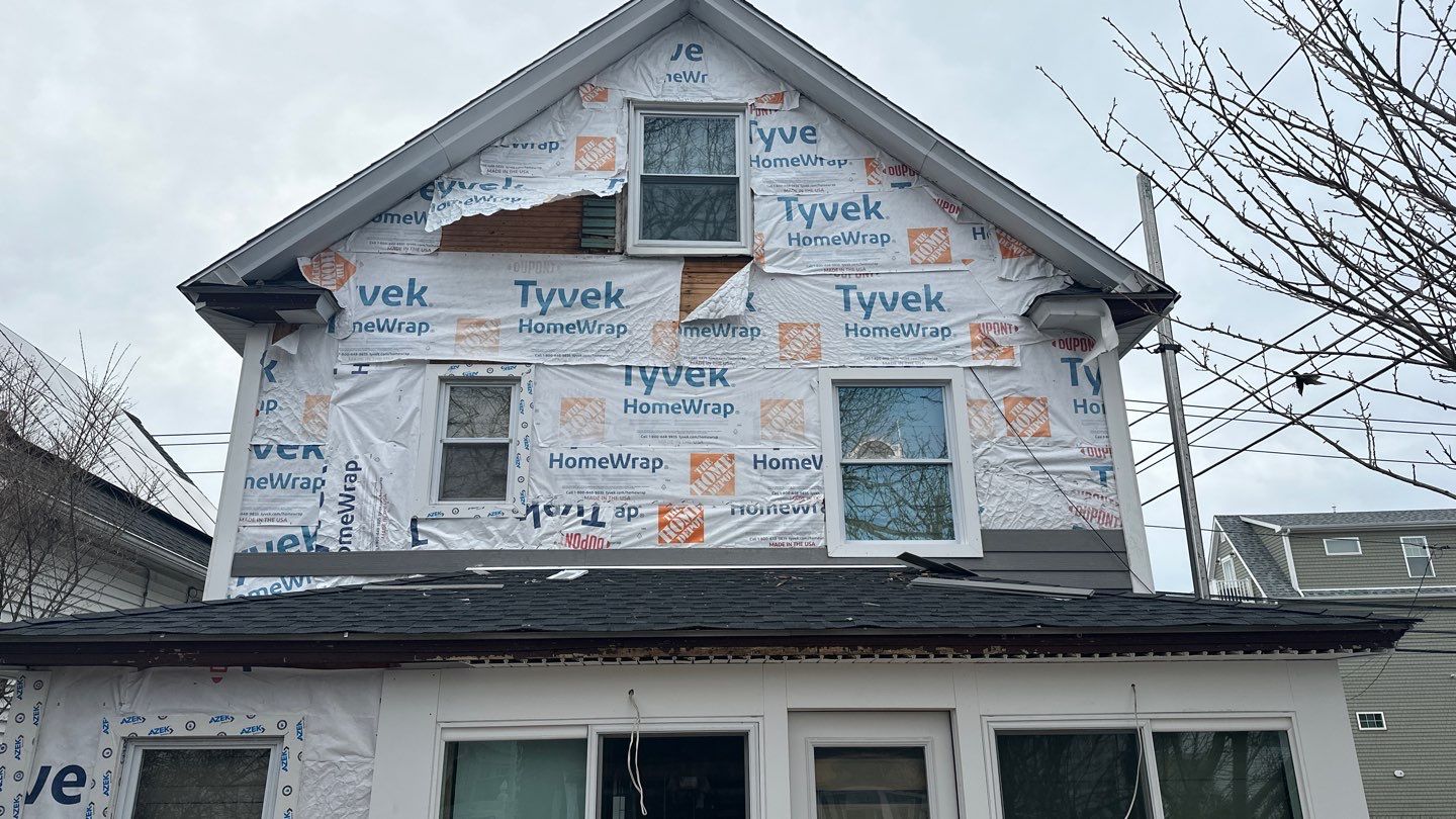 Siding Installation using Hardie Plank Aged Pewter by A Plus Exterior