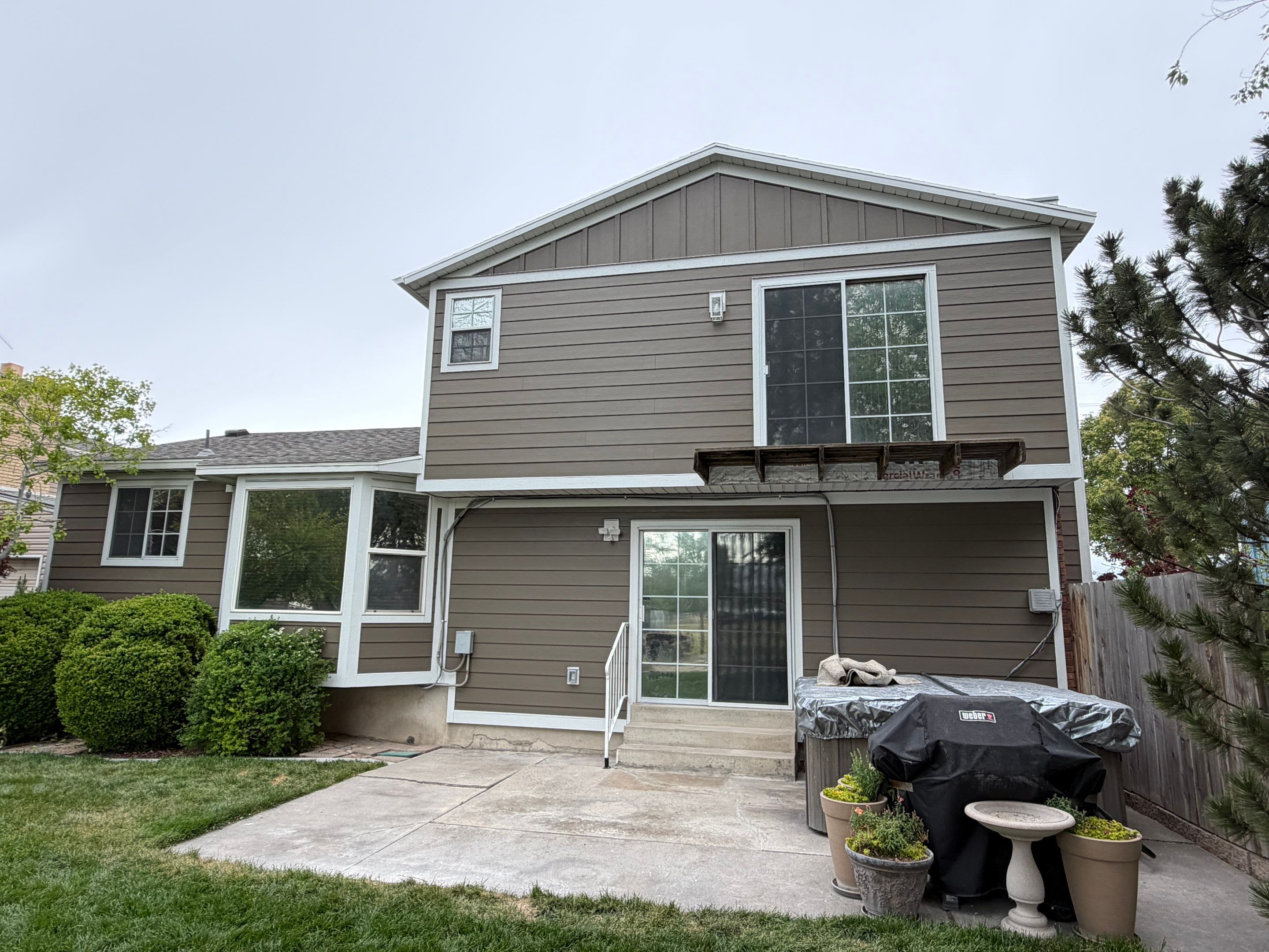 West Valley City | Aluminum to Hardie Conversion | Timber Bark & Arctic White by Ideal Siding Utah