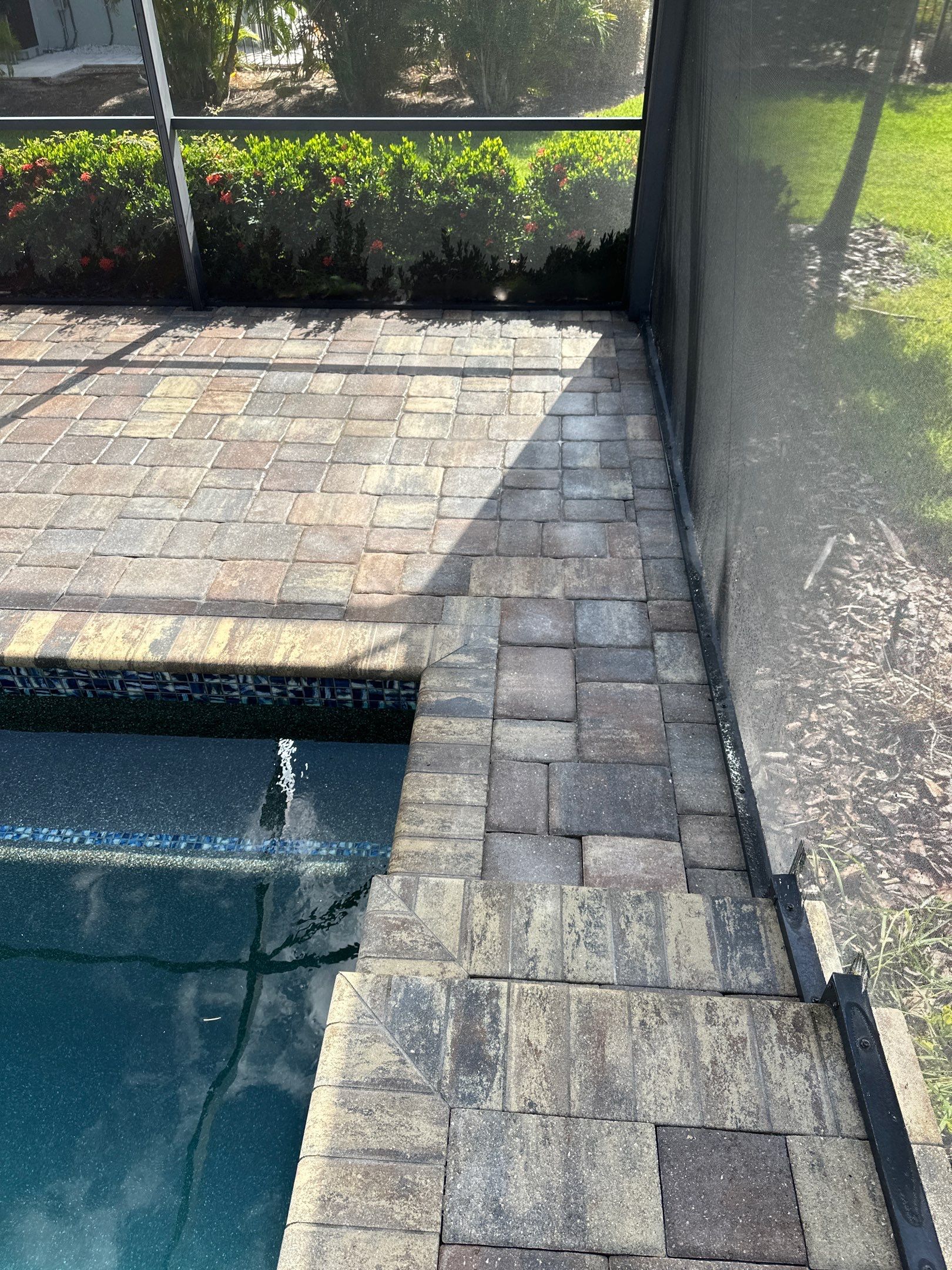 Paver Driveway, Sidewalk, and Pool Deck Cleaning in Winding River Community, Bradenton, FL by Sunshine AquaWash