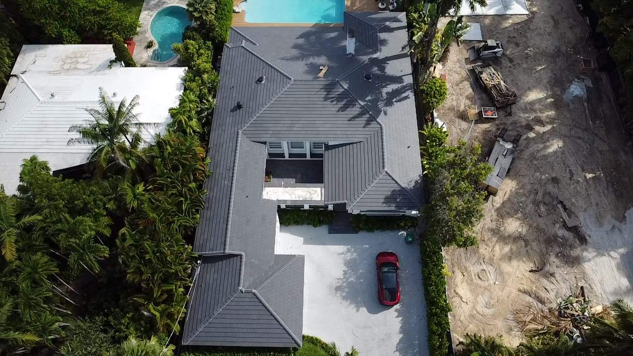 Tile Roof Saxony 900 Dark Charcoal by City Roofing Inc