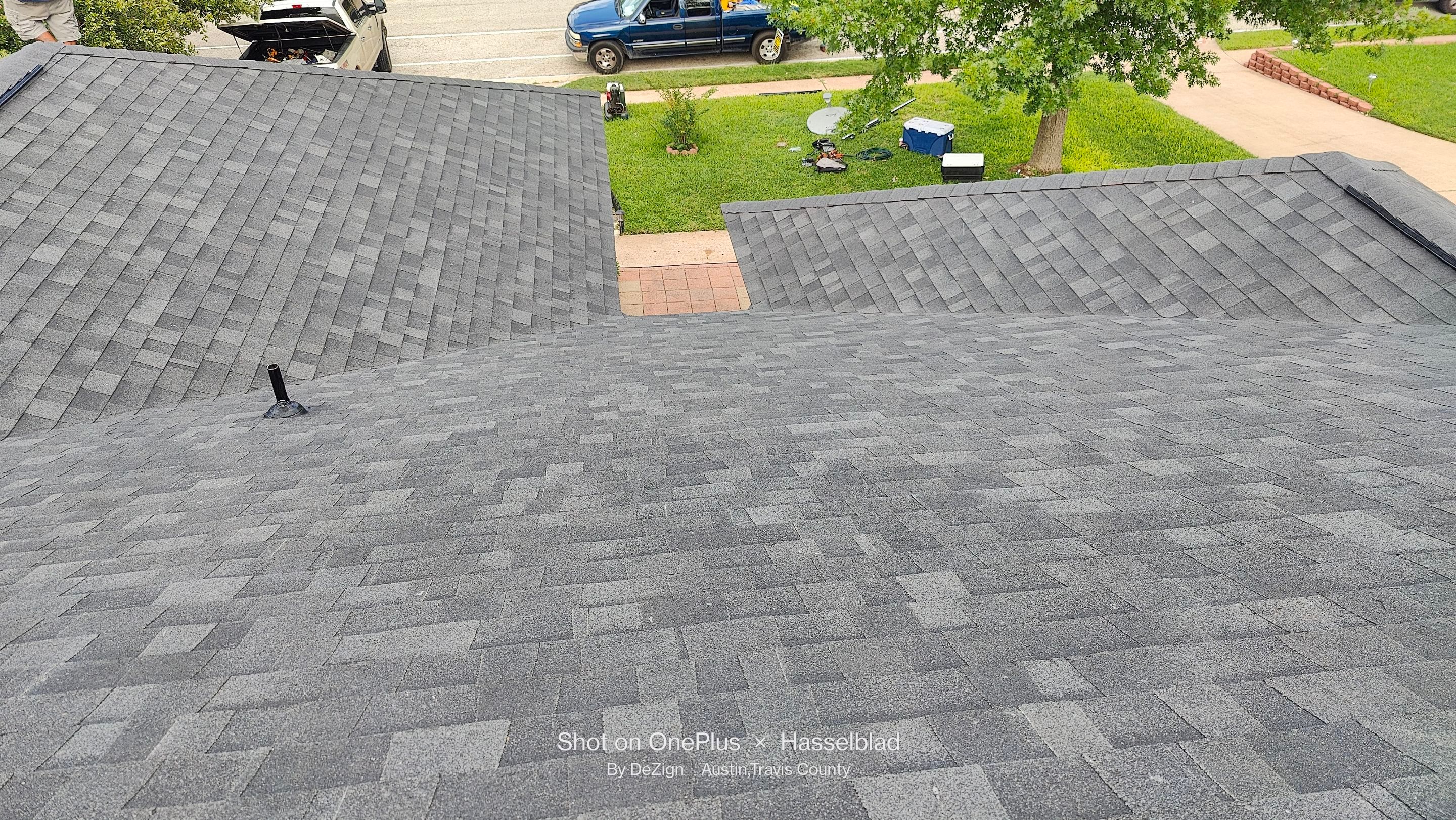 Residential Roofing Installation using Owens Corning Oakridge Onyx Black by DeZign Roofing & Exteriors