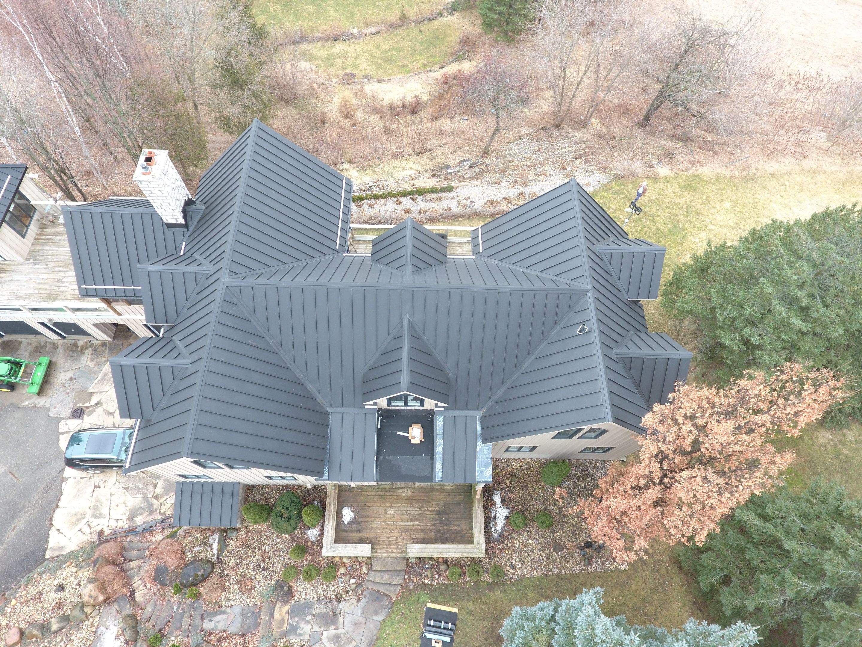 Residential Roofing Installation using 24 Ga Standing Seam Metal by Jay Carter Roofing & Sheet Metal