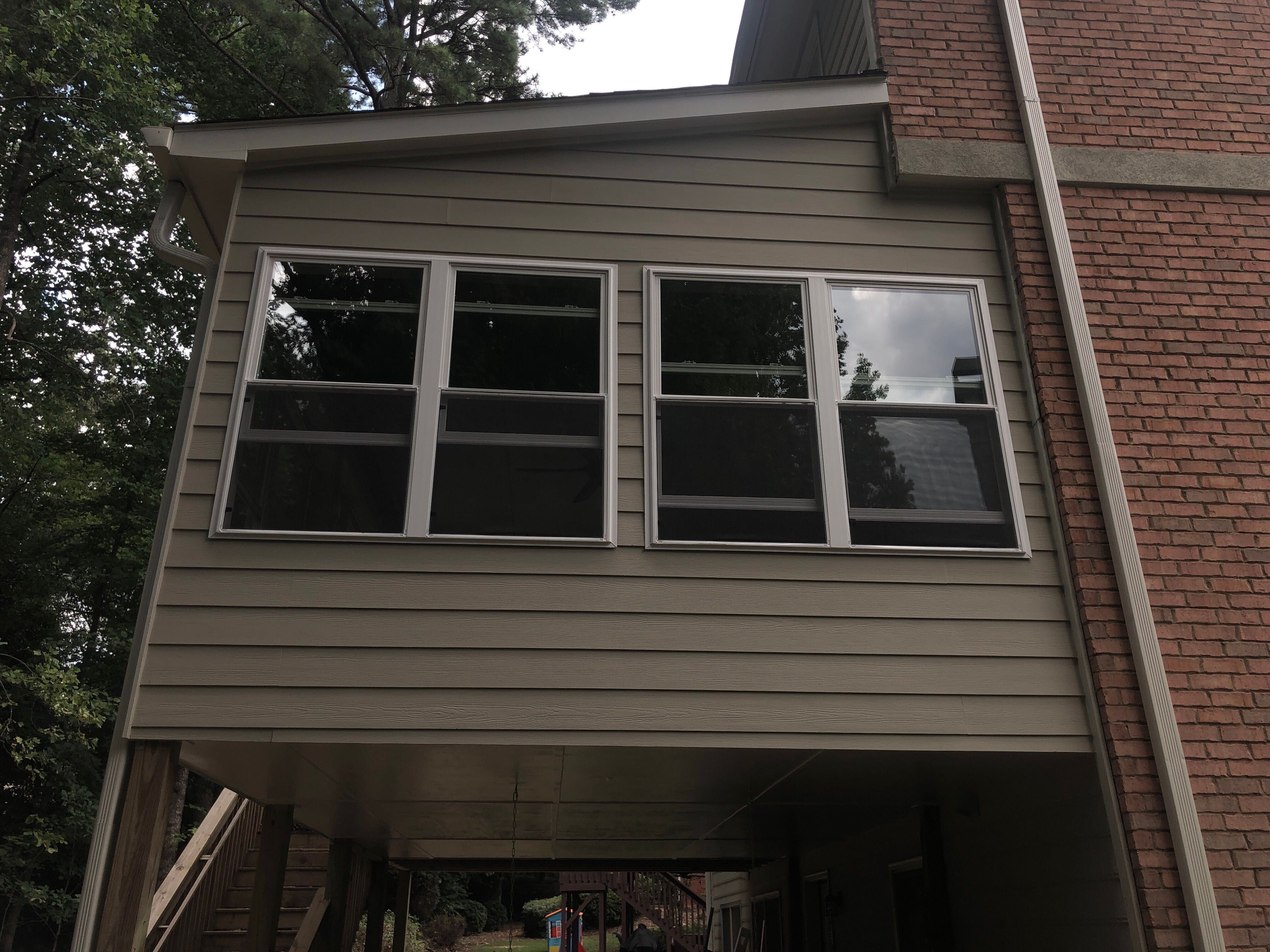 Second-Story Sunroom Addition and Screened Porch Conversion in Dunwoody by Swift Home Renovations 