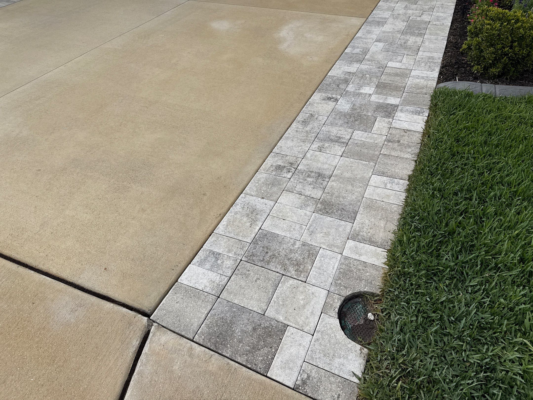 Rust Stain Removal from Concrete Driveway and Pavers in Park East at Azario | Lakewood Ranch, FL by Sunshine AquaWash