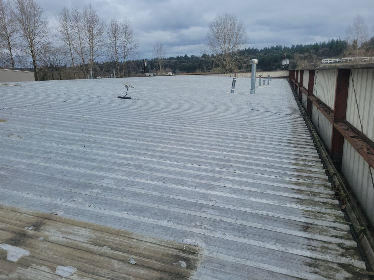 2025 Woodinville Commercial Metal Retrofit Overlay by Alternative Roofing Systems Inc.