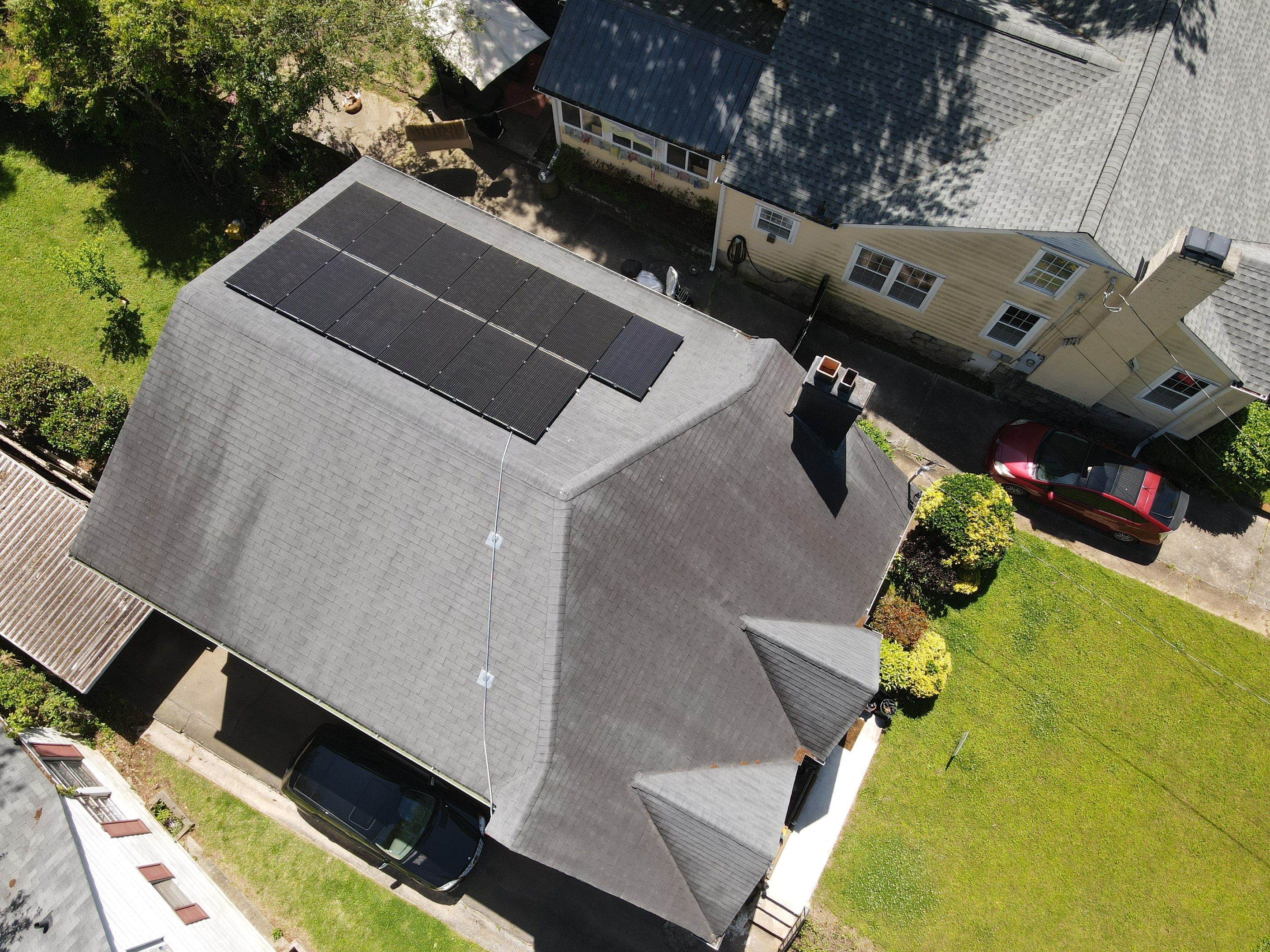 Residential Roof Replacement using Owens Corning Trudef Twilight Black by Inspector Roofing and Restoration