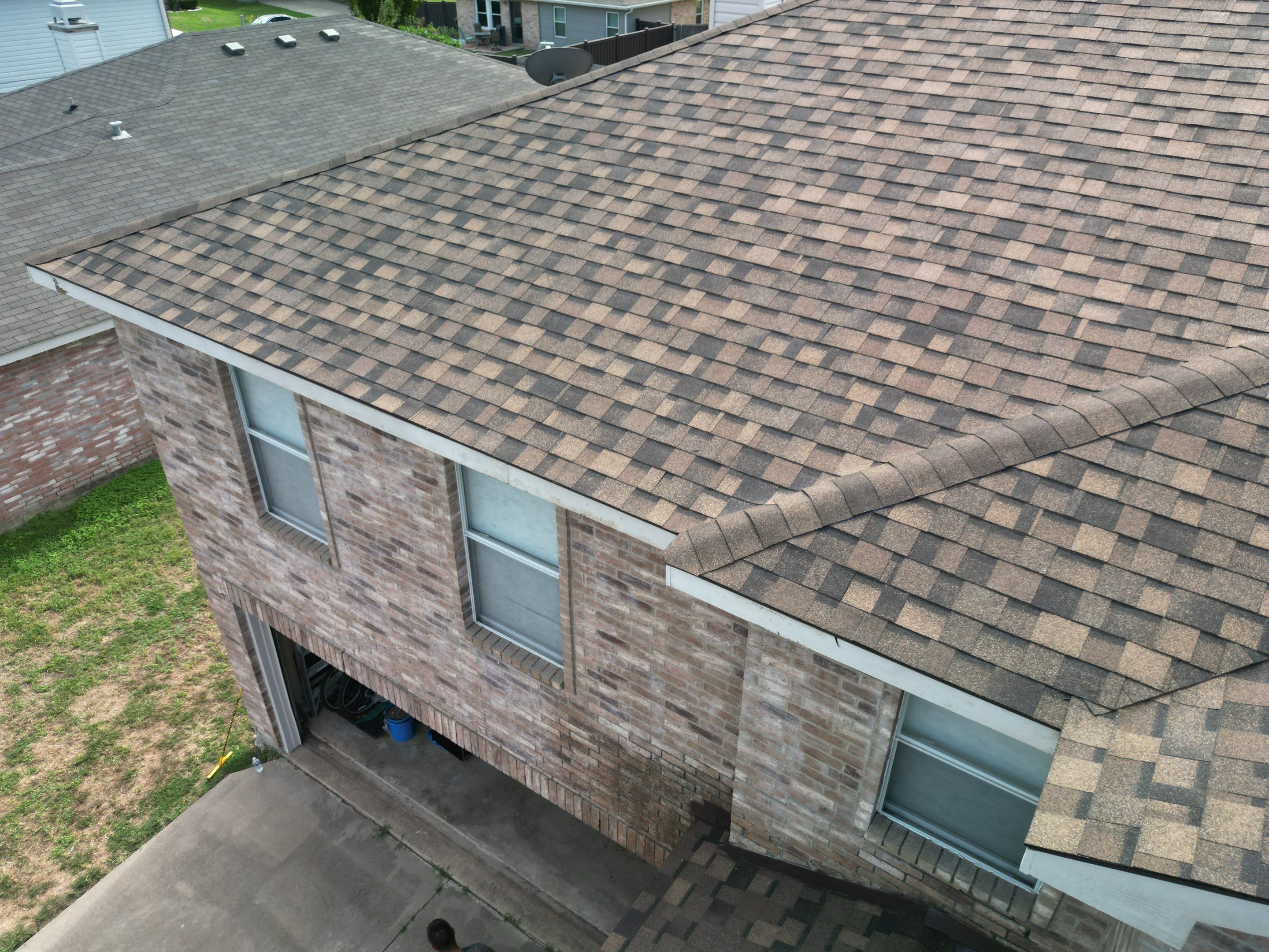 Full Roof Replacement, Chimney Rebuild and Interior Damage Replacement by First United Roofing & Construction