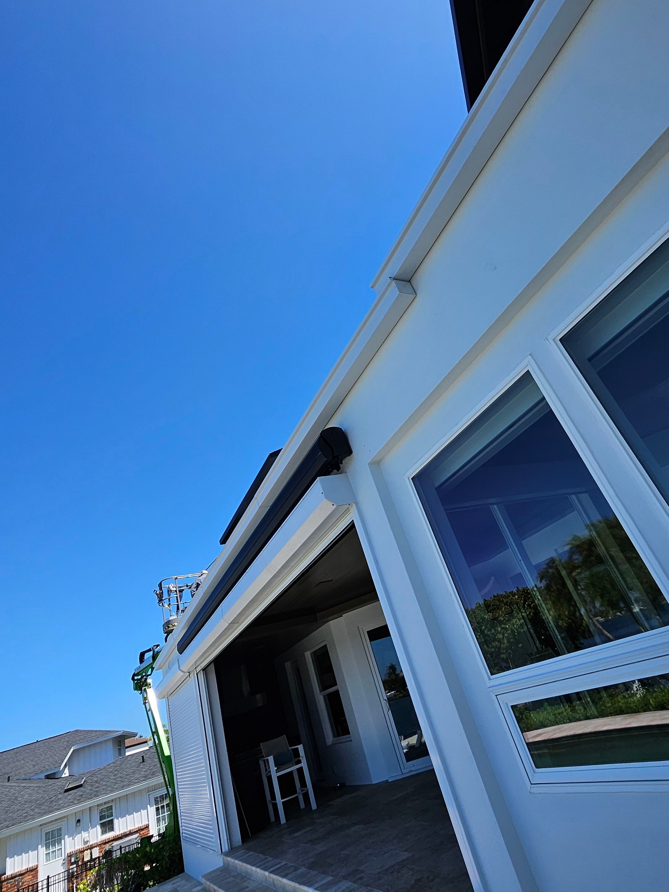 Soffit and Fascia Installation and black seamless gutters in Sarasota FL by Gutter Professors