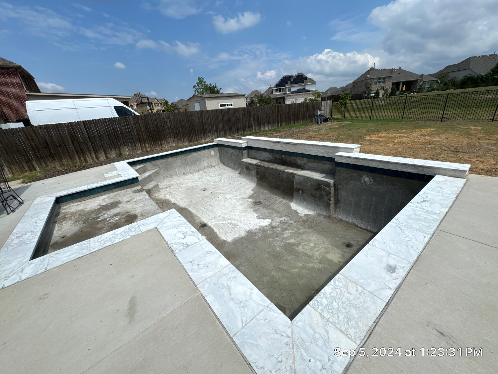 Crisp Geometric Pool with Sun Shelf by Pinnacle Pools and Spas - DFW