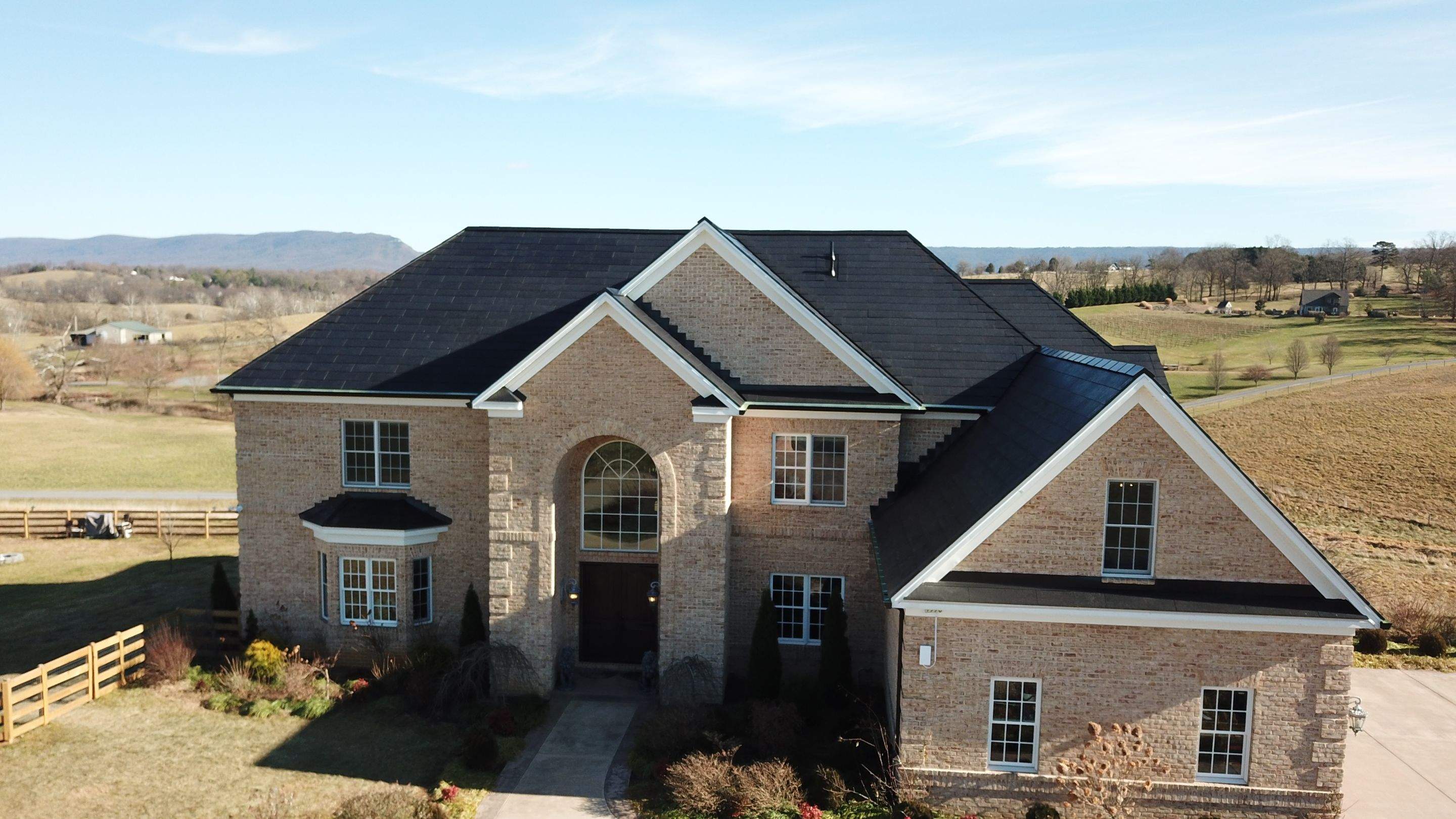 Tesla Solar Roof Replacement  by American Home Contractors