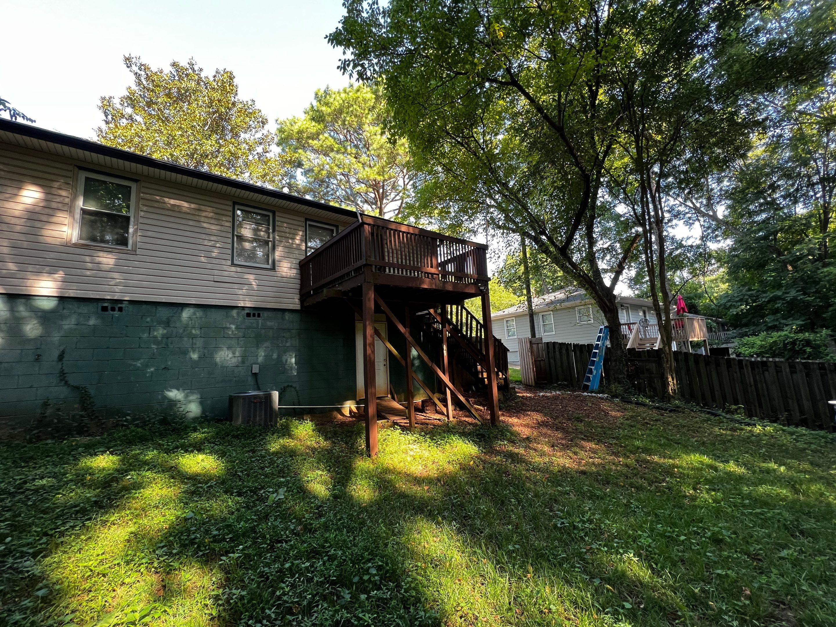 Elevated Pressure-Treated Wood Deck and Staircase Replacement in Atlanta by Swift Home Renovations