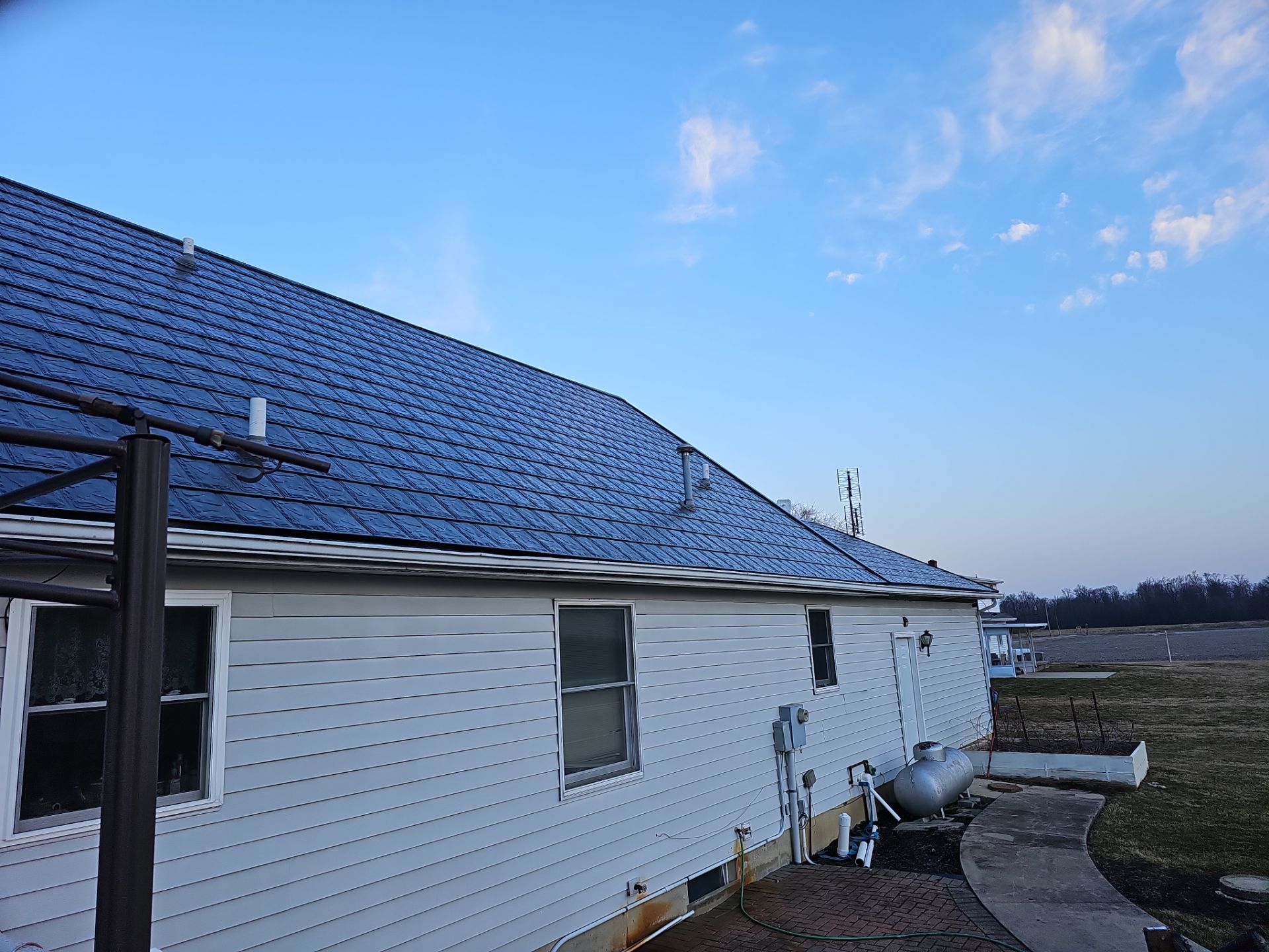Residential Roofing Installation using Metstar Slate Plus Smooth Black by Nitro Roofing and Construction