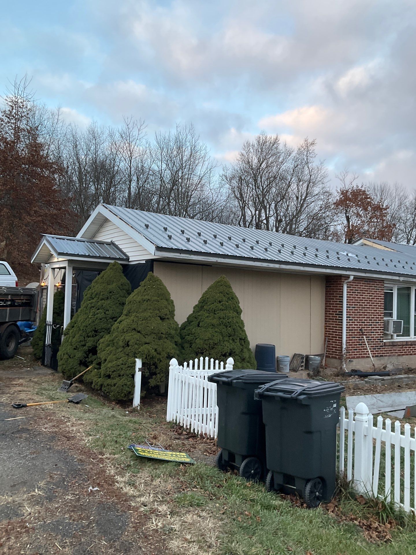 Metal Roofing Replacement and Sunroom Addition in Halifax by Esh Builders