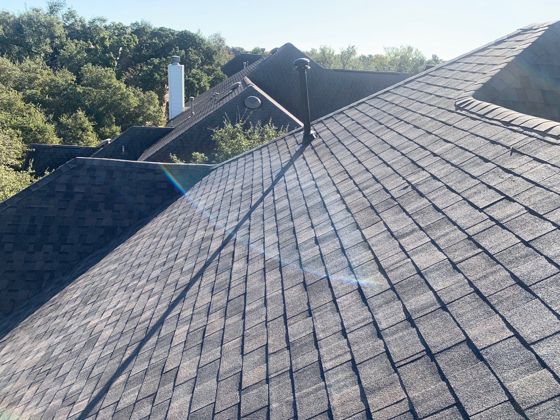 Hail Damage Restoration and Asphalt Shingle Roof Replacement in Austin by Caliber Restoration LLC