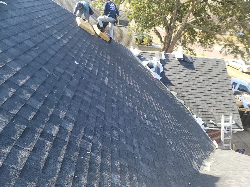 Residential Roofing Installation using Roof Replacement by American Roofing & Construction LLC