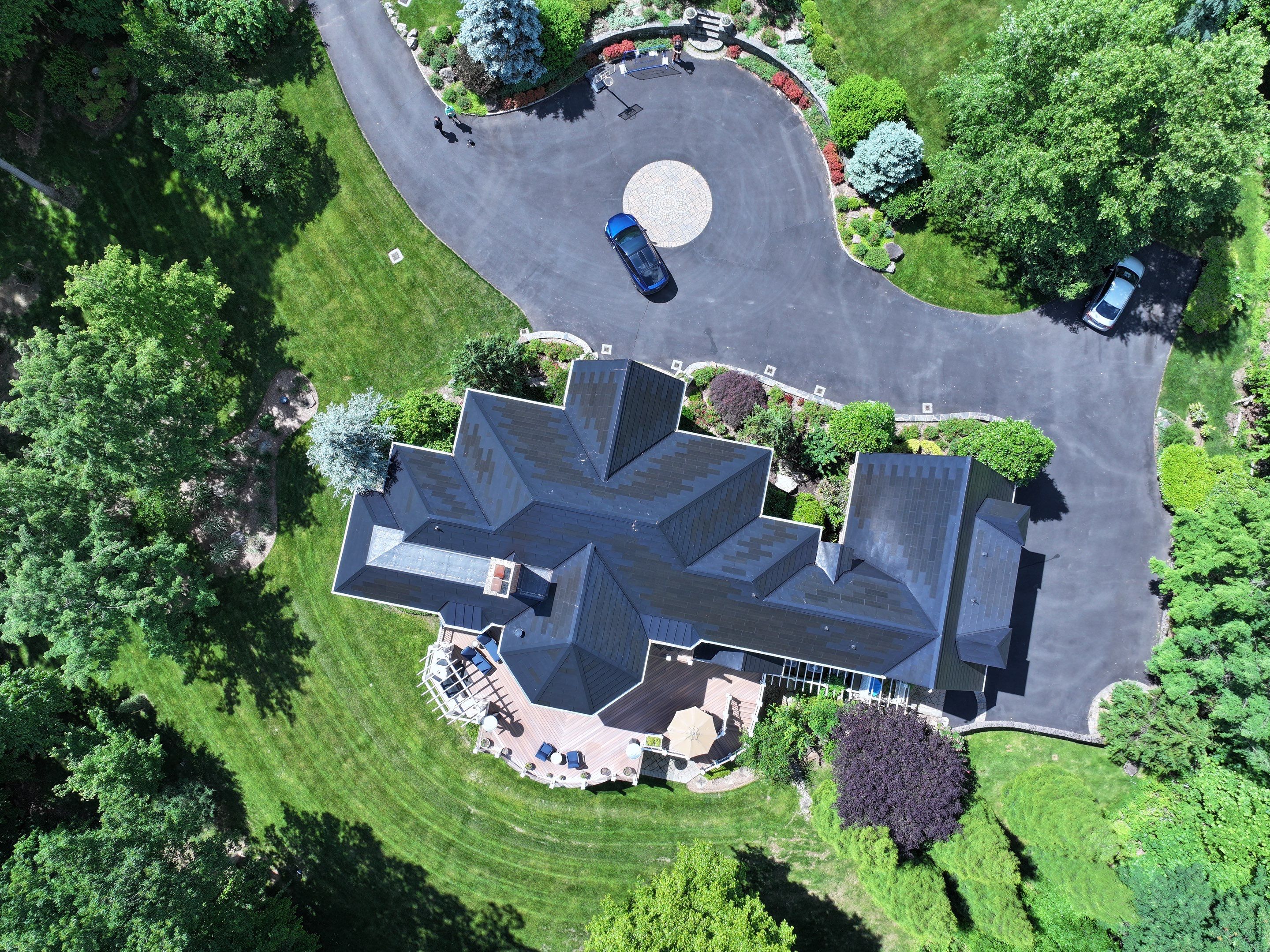 Tesla Solar Roof Replacement by American Home Contractors