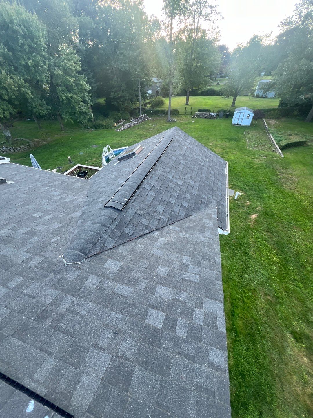 Onyx Black Shingles by Reimagine Roofing