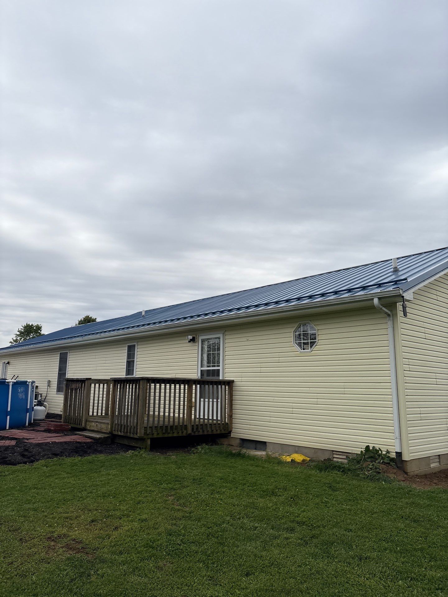 M Panel Metal Roofing - Gallery Blue by Hoel Roofing & Remodeling