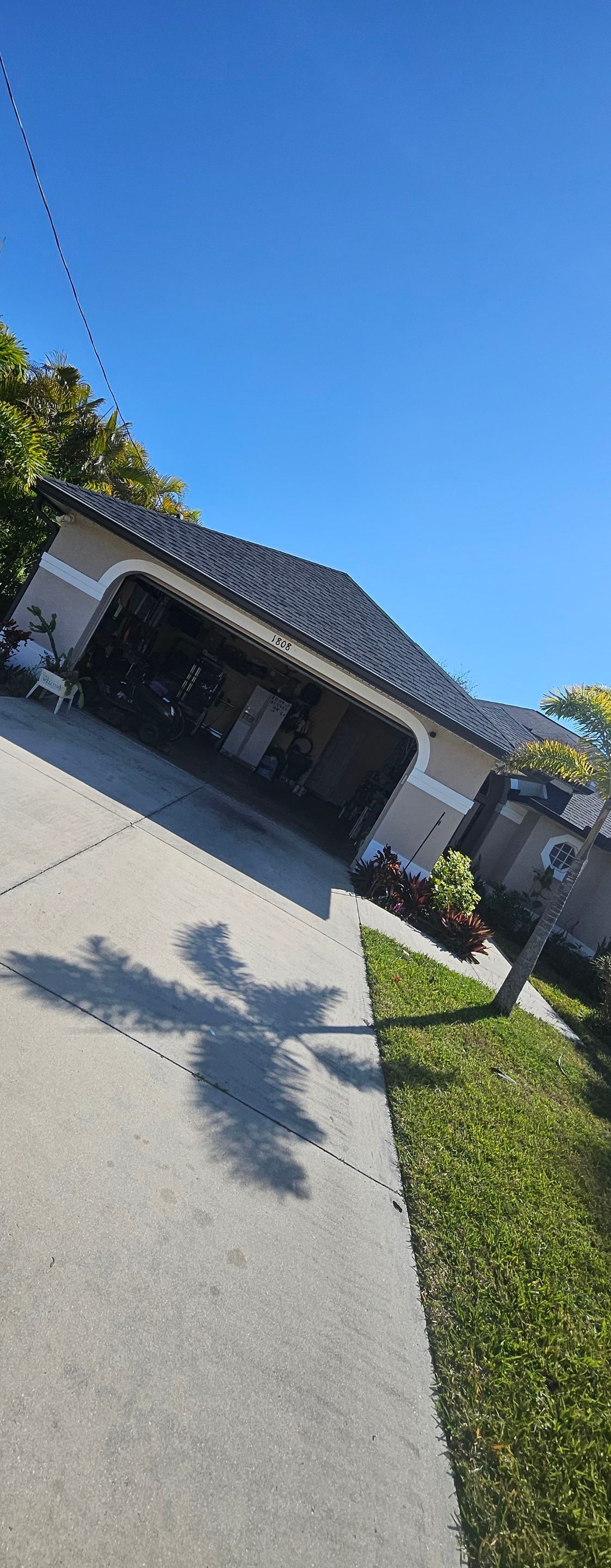 Dark Bronze Seamless Gutters using 6-Inch Seamless Gutters in Cape Coral FL by Gutter Professors