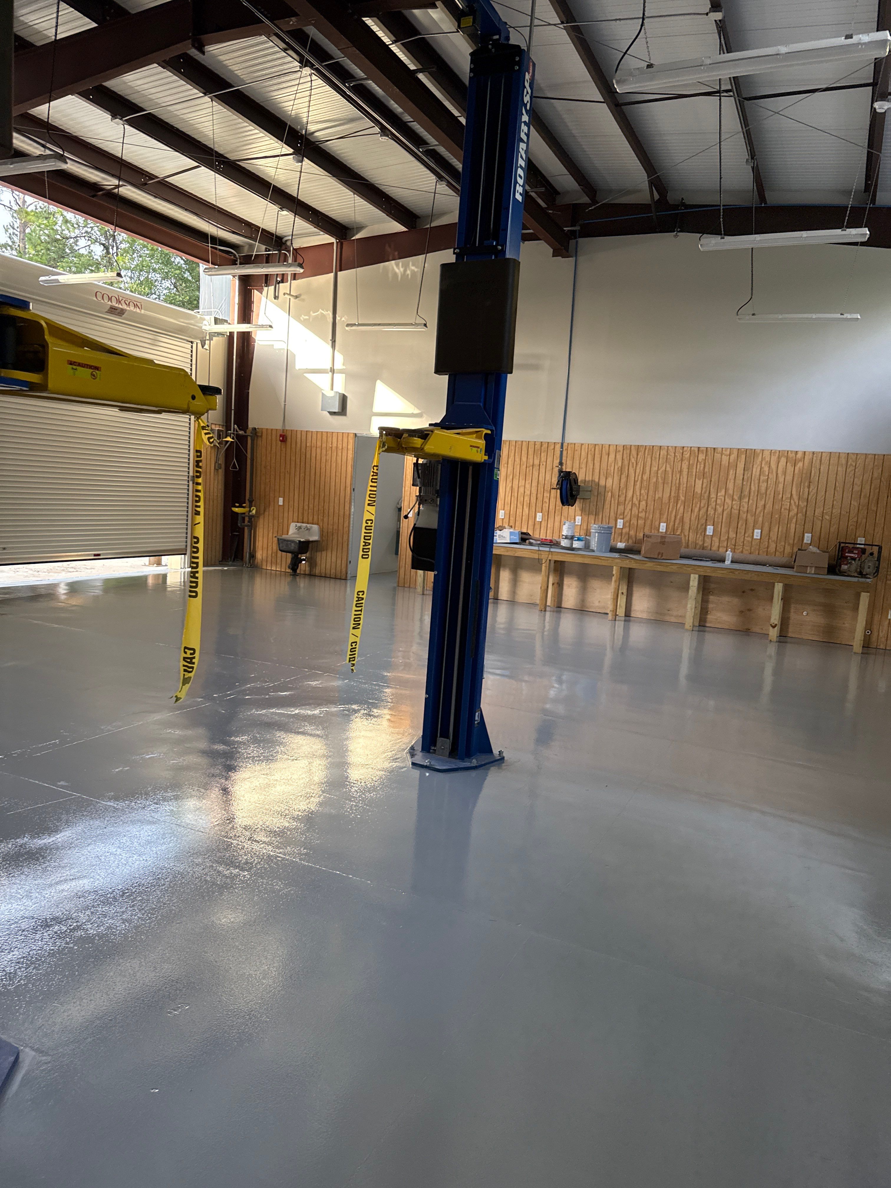 Industrial Epoxy Flooring for Sandhill Crane Workshop in Gautier by Cornerstone Hard Surface Restoration 