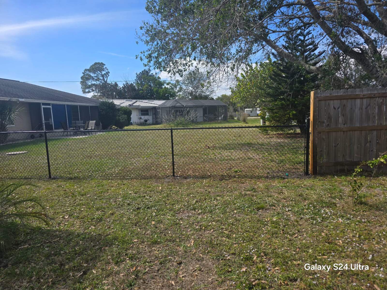 Black Chain Link Fence Installation for Port Charlotte Residence by True Fence LLC