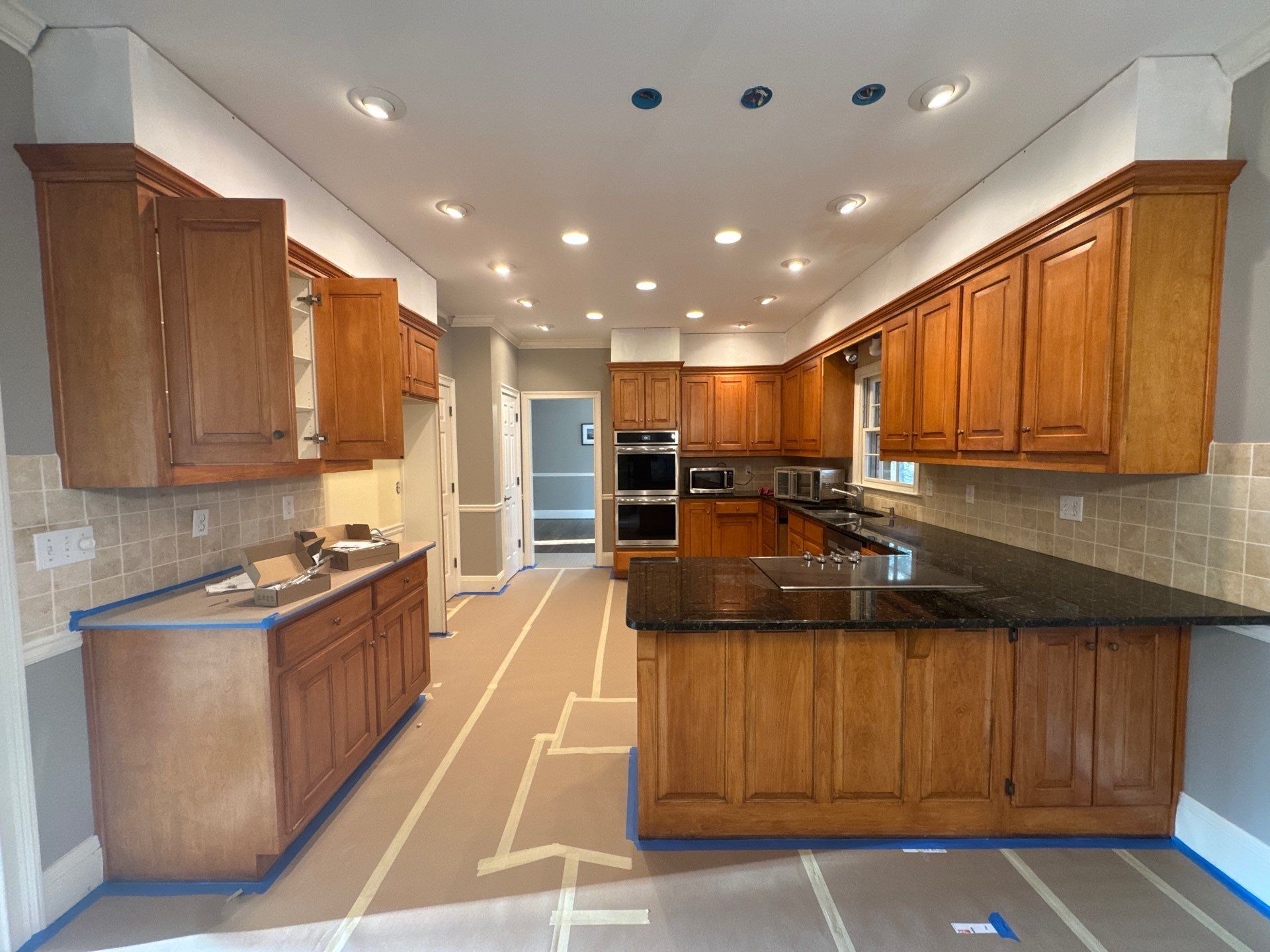 Dark Walnut Hardwood Floor Refinishing and Cabinet Painting in Atlanta by Swift Home Renovations