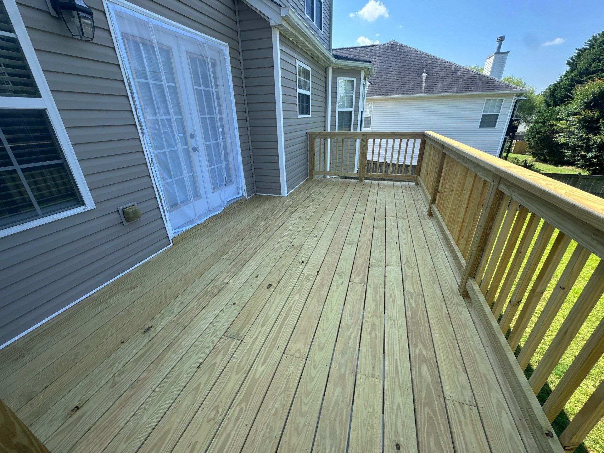 Multi-Level Deck Restoration and Solid Color Staining in Suwanee by Swift Home Renovations