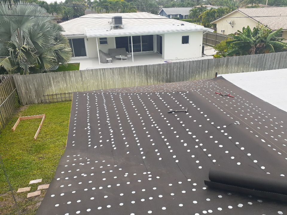 Residential Roofing Installation using 1" Nail strip metal roof by BLUES BROTHERS ROOFING