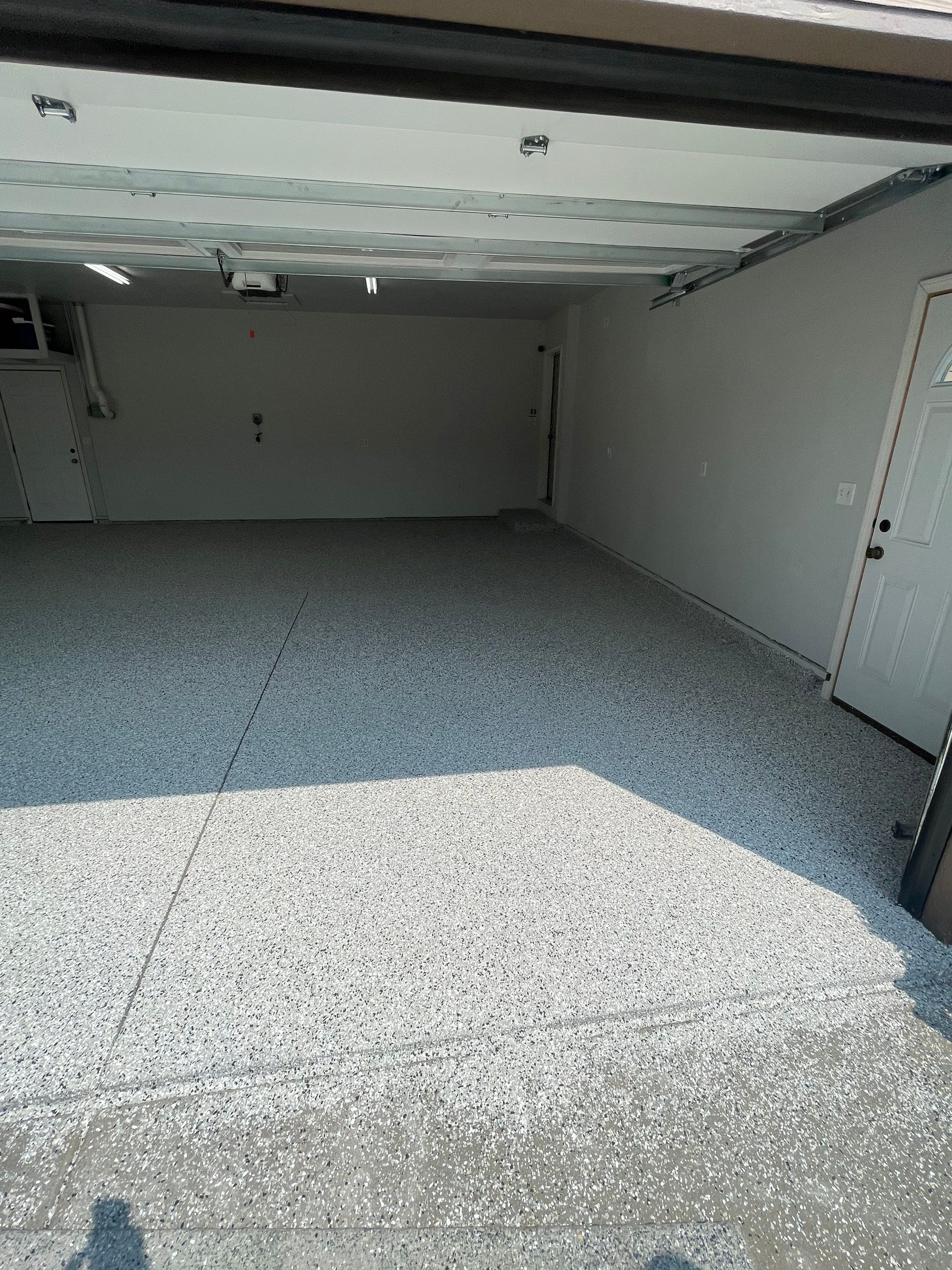Multi-Car Garage Floor Coating and Crack Repair in Tea by Select Painting, Coatings & Garage Cabinets